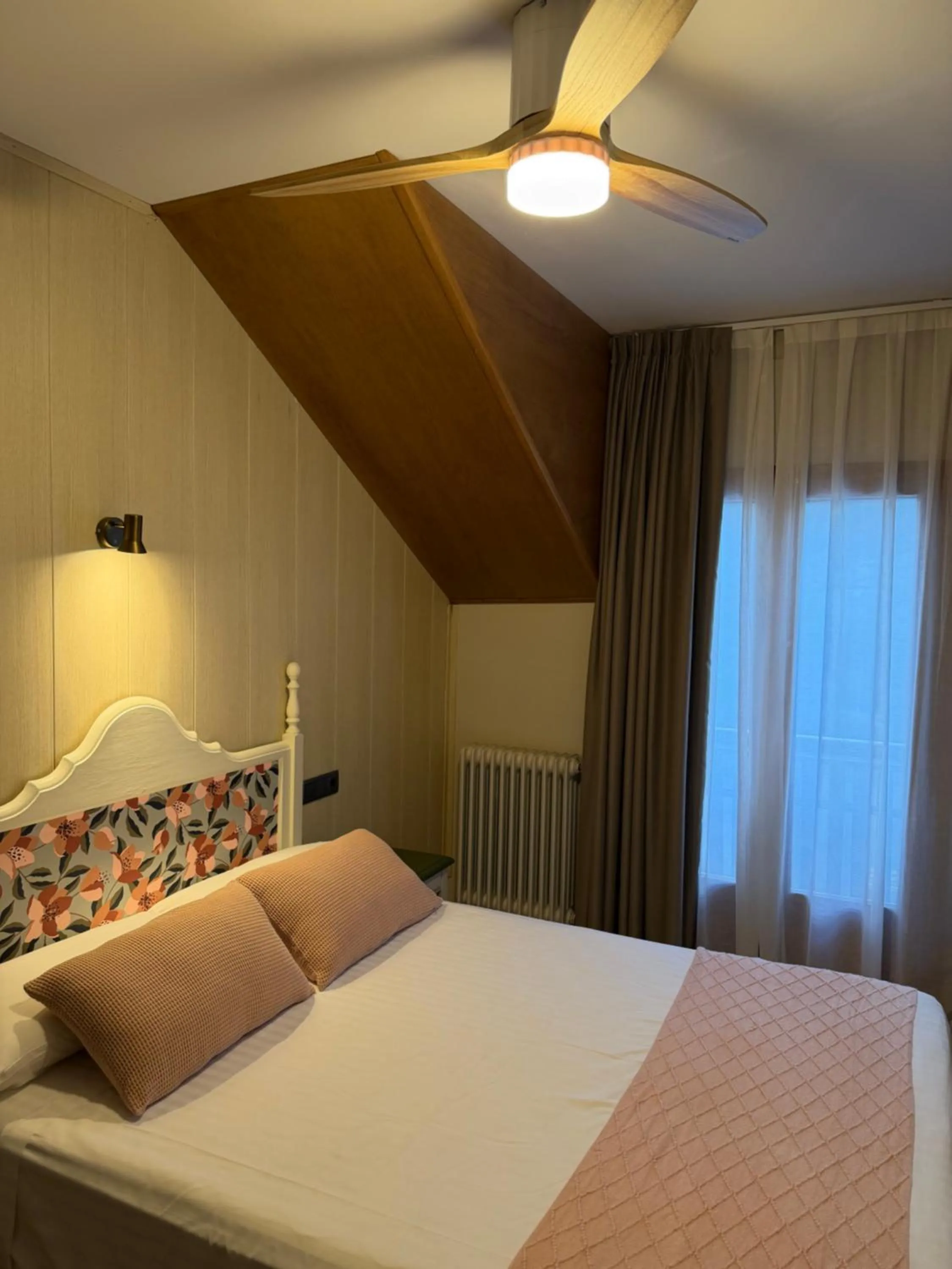 Bed in Edelweiss Hotel