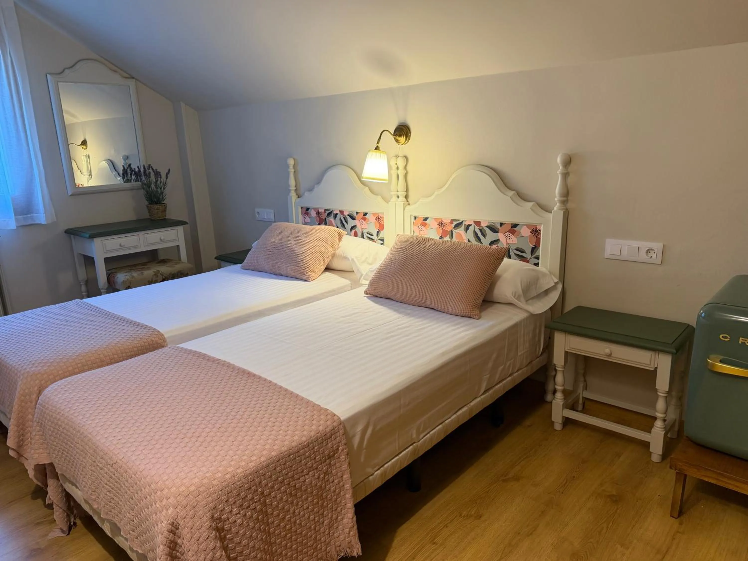 Bed in Edelweiss Hotel