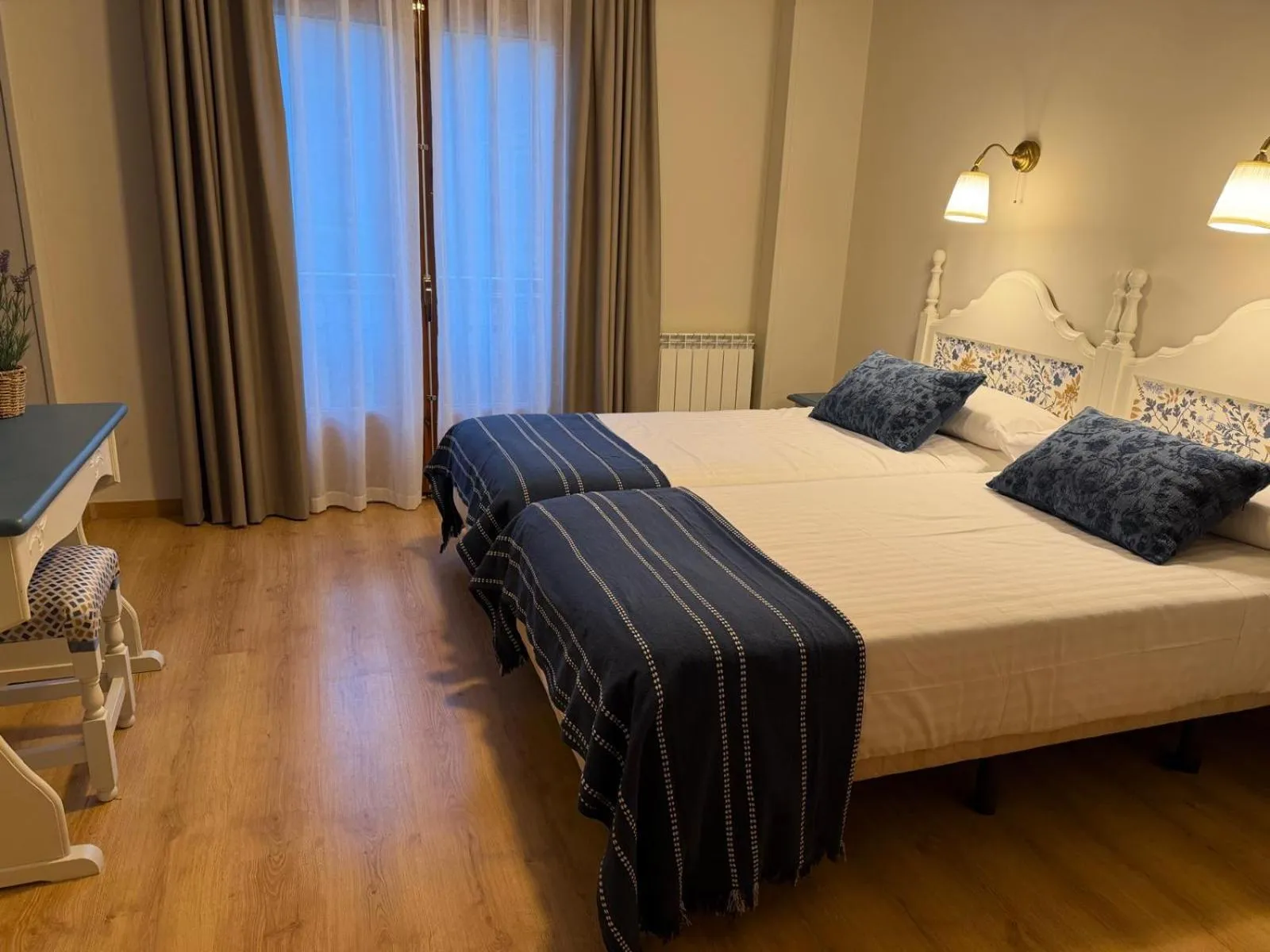 Bed in Edelweiss Hotel