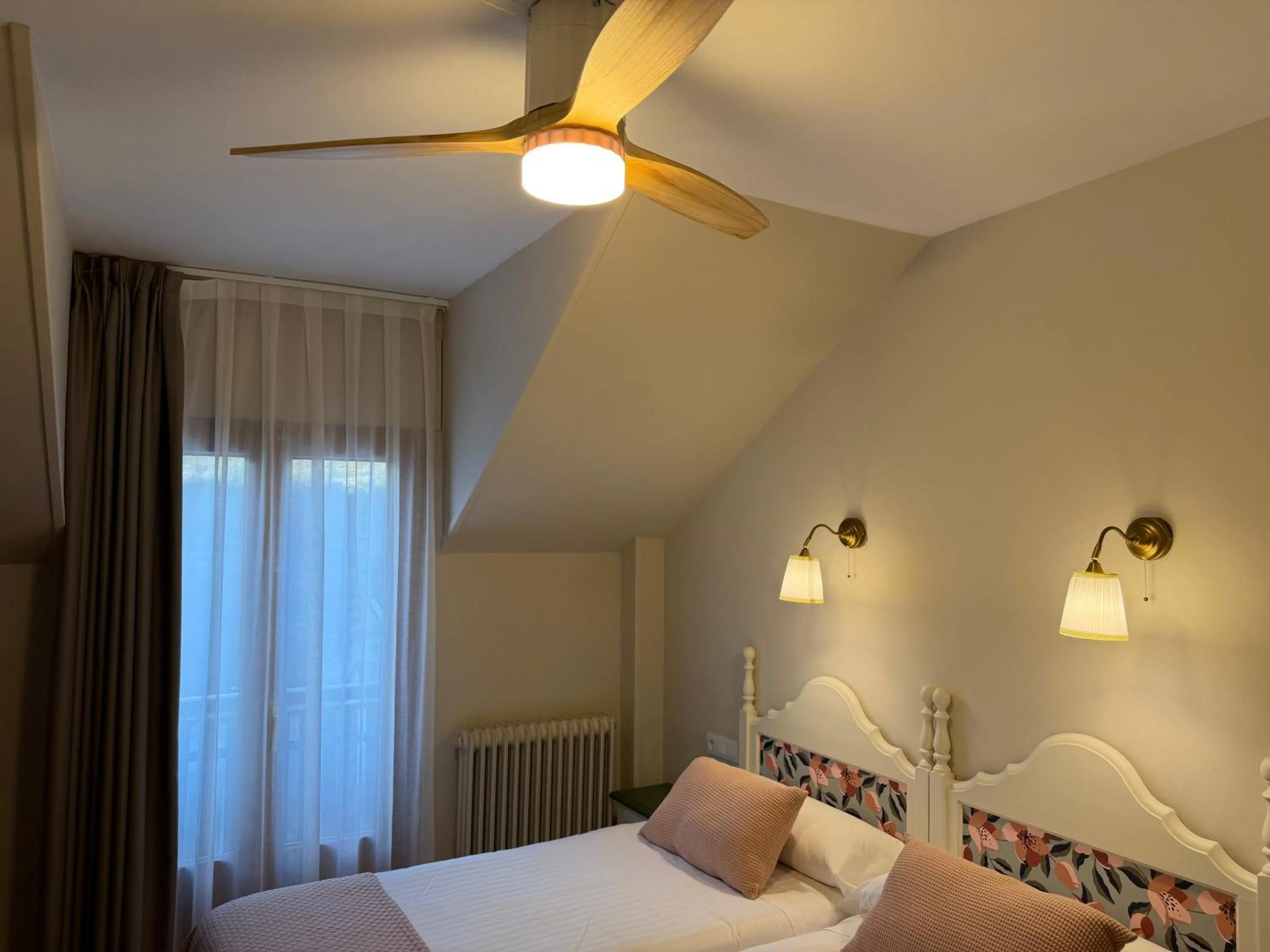 Bed in Edelweiss Hotel