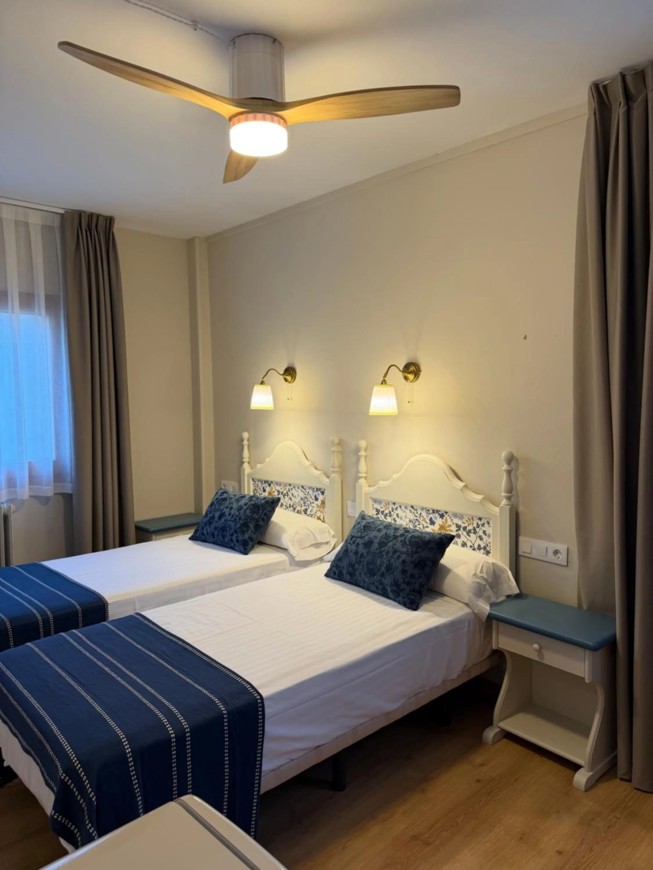 Bed in Edelweiss Hotel