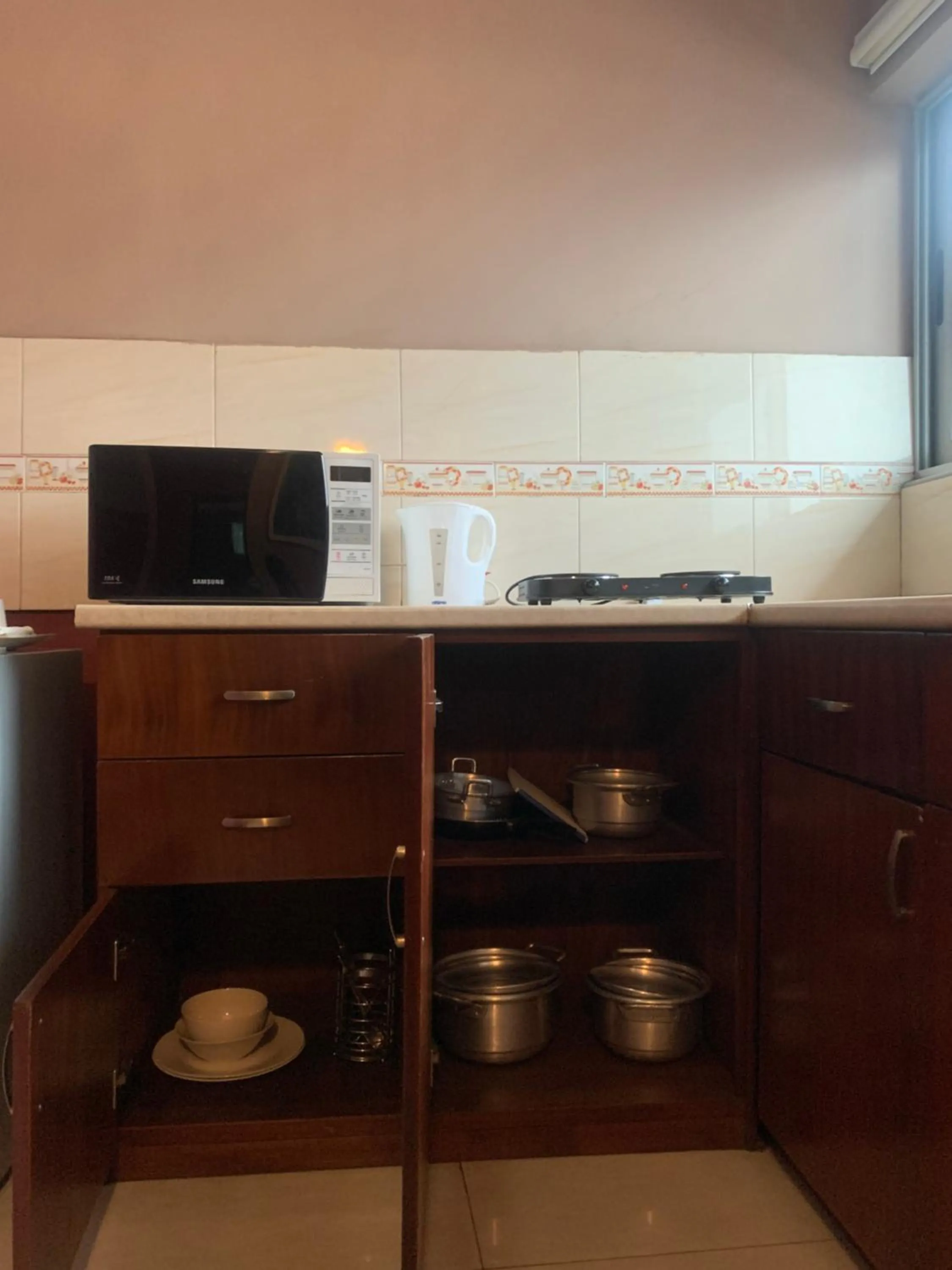 Kitchen or kitchenette in Manjaro Suites