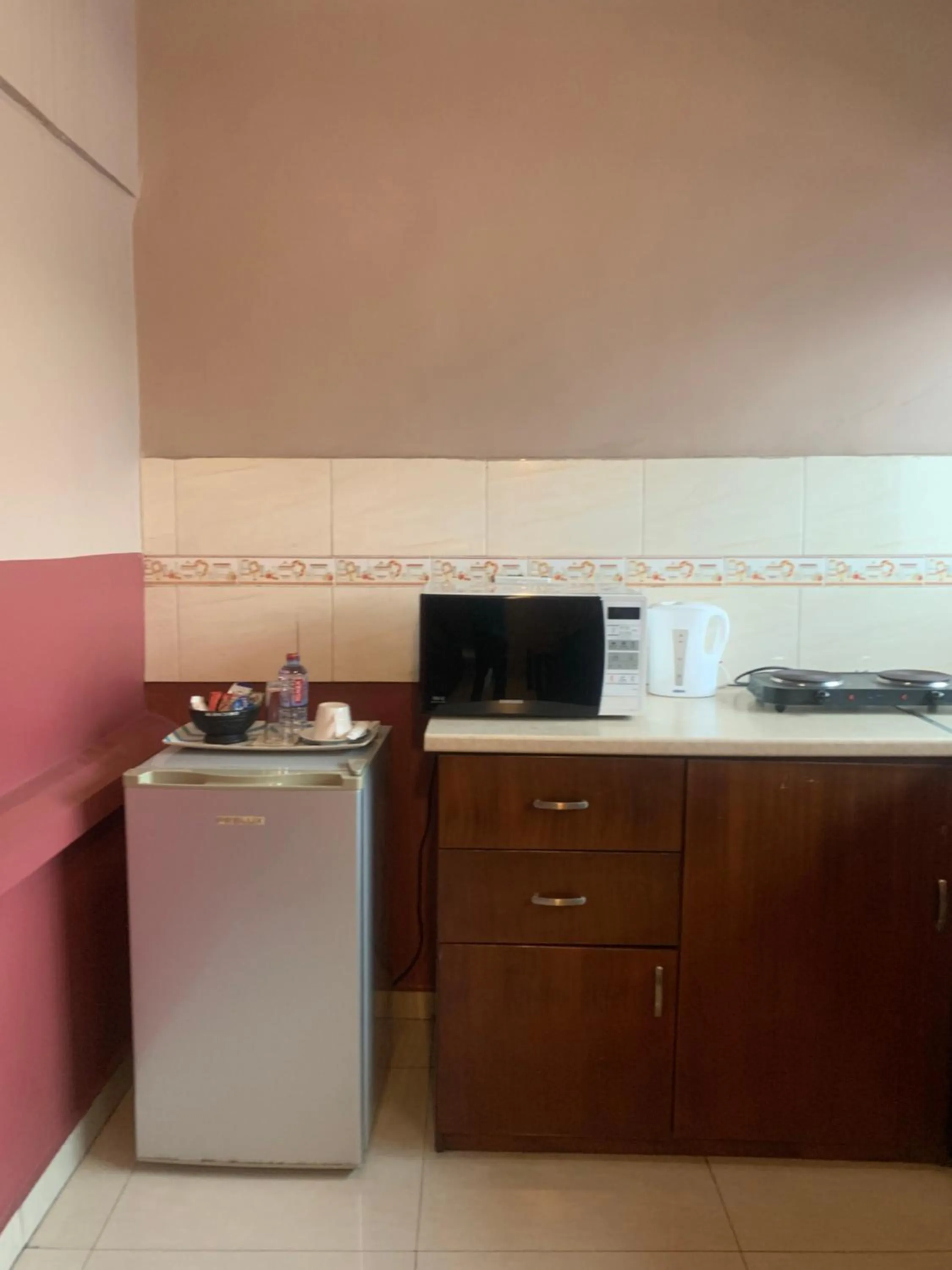 Kitchen or kitchenette in Manjaro Suites