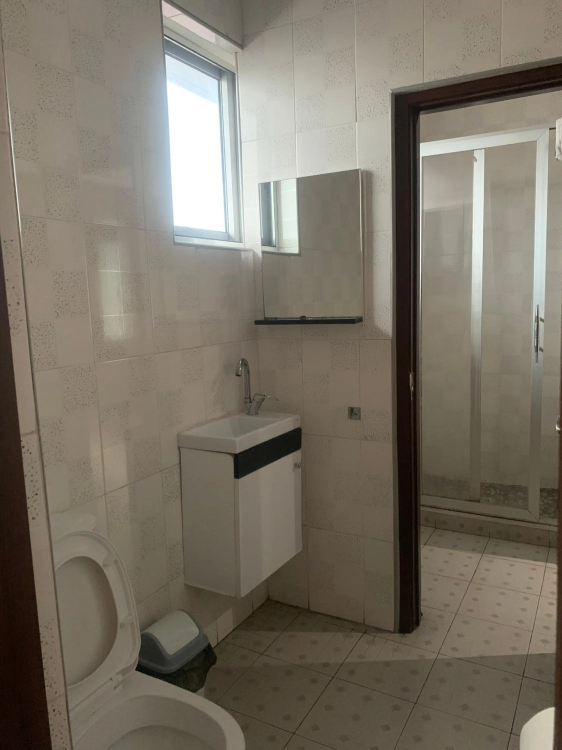 Toilet in Manjaro Suites