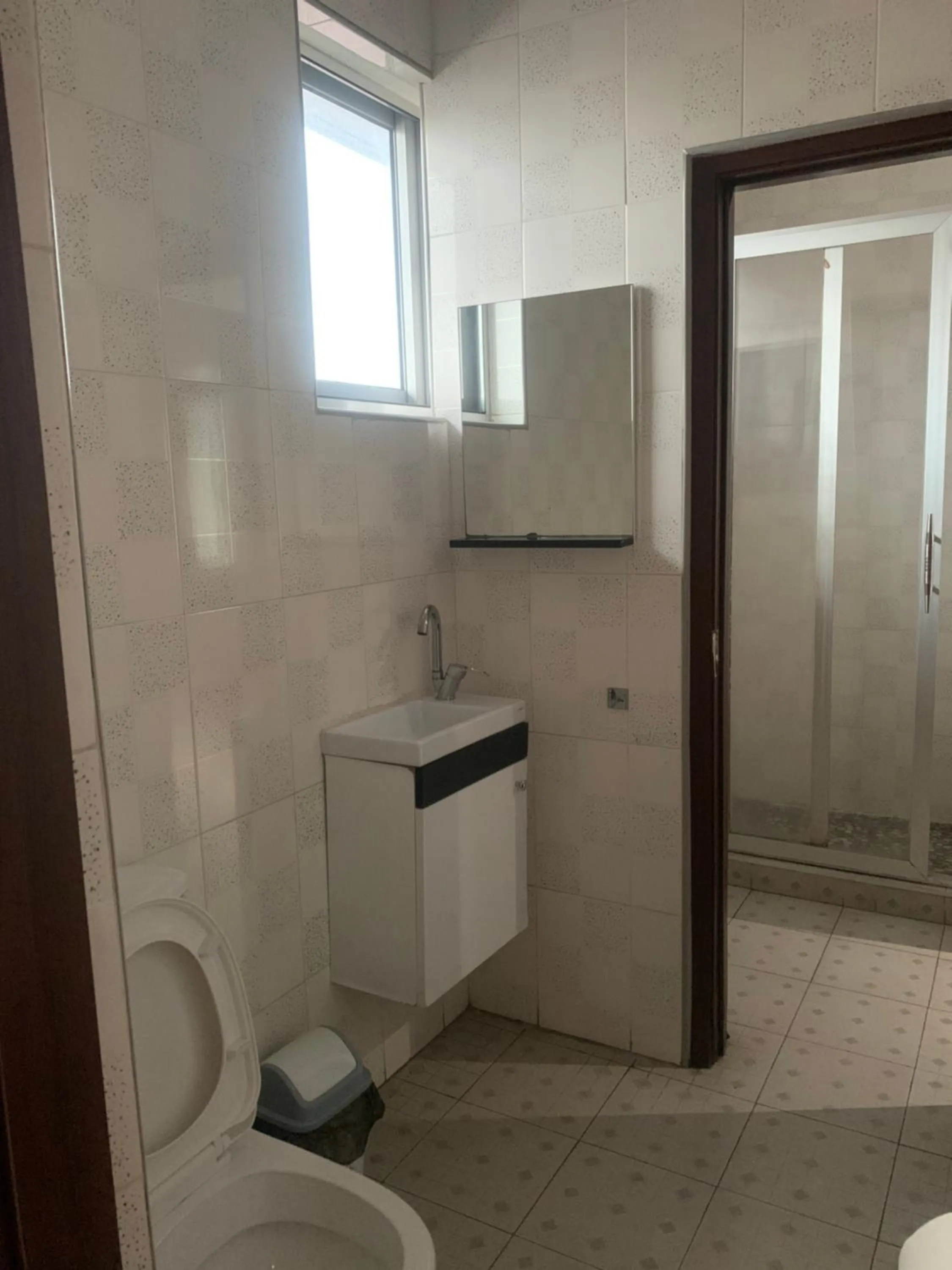 Toilet in Manjaro Suites