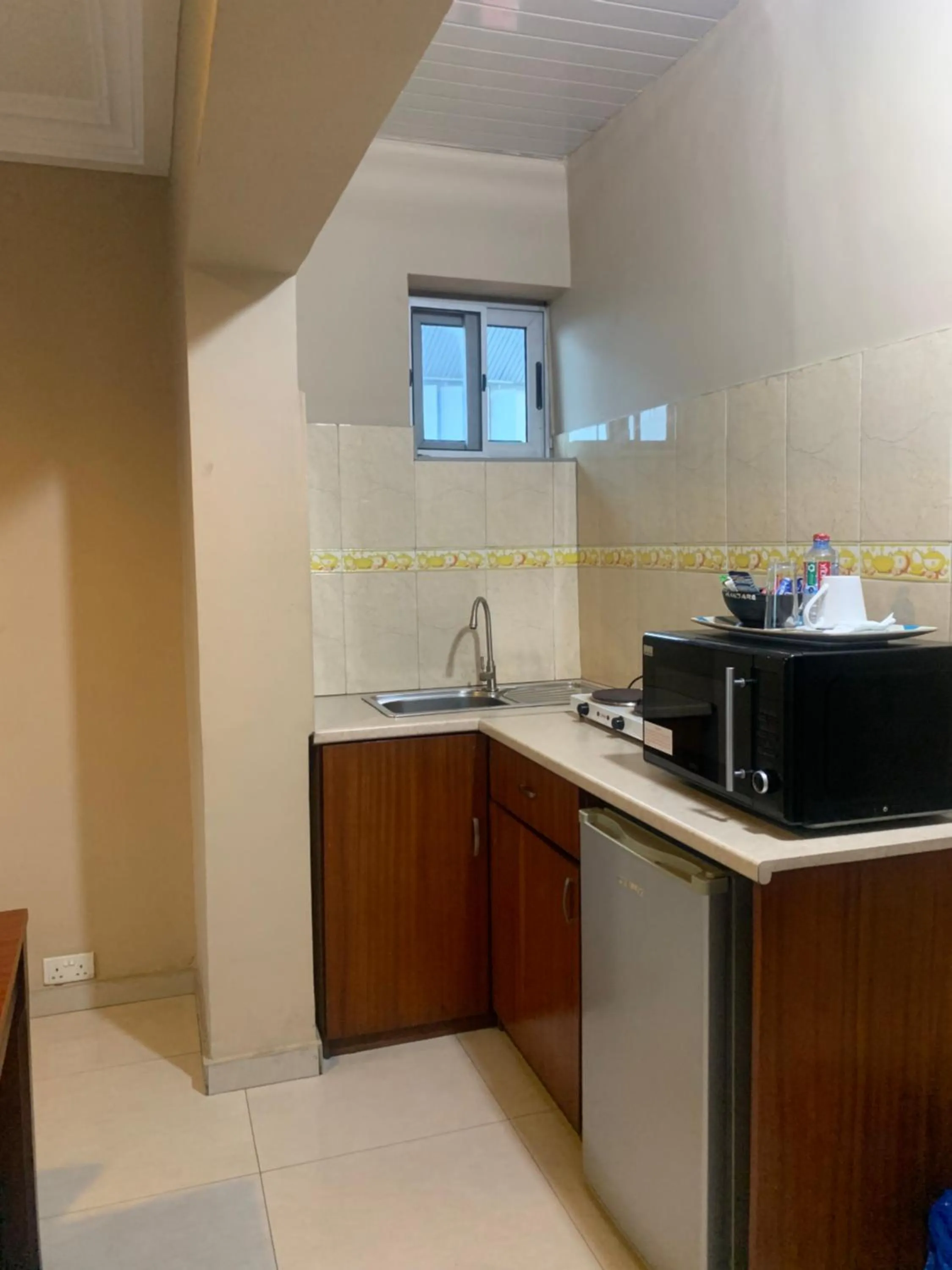 Kitchen or kitchenette in Manjaro Suites