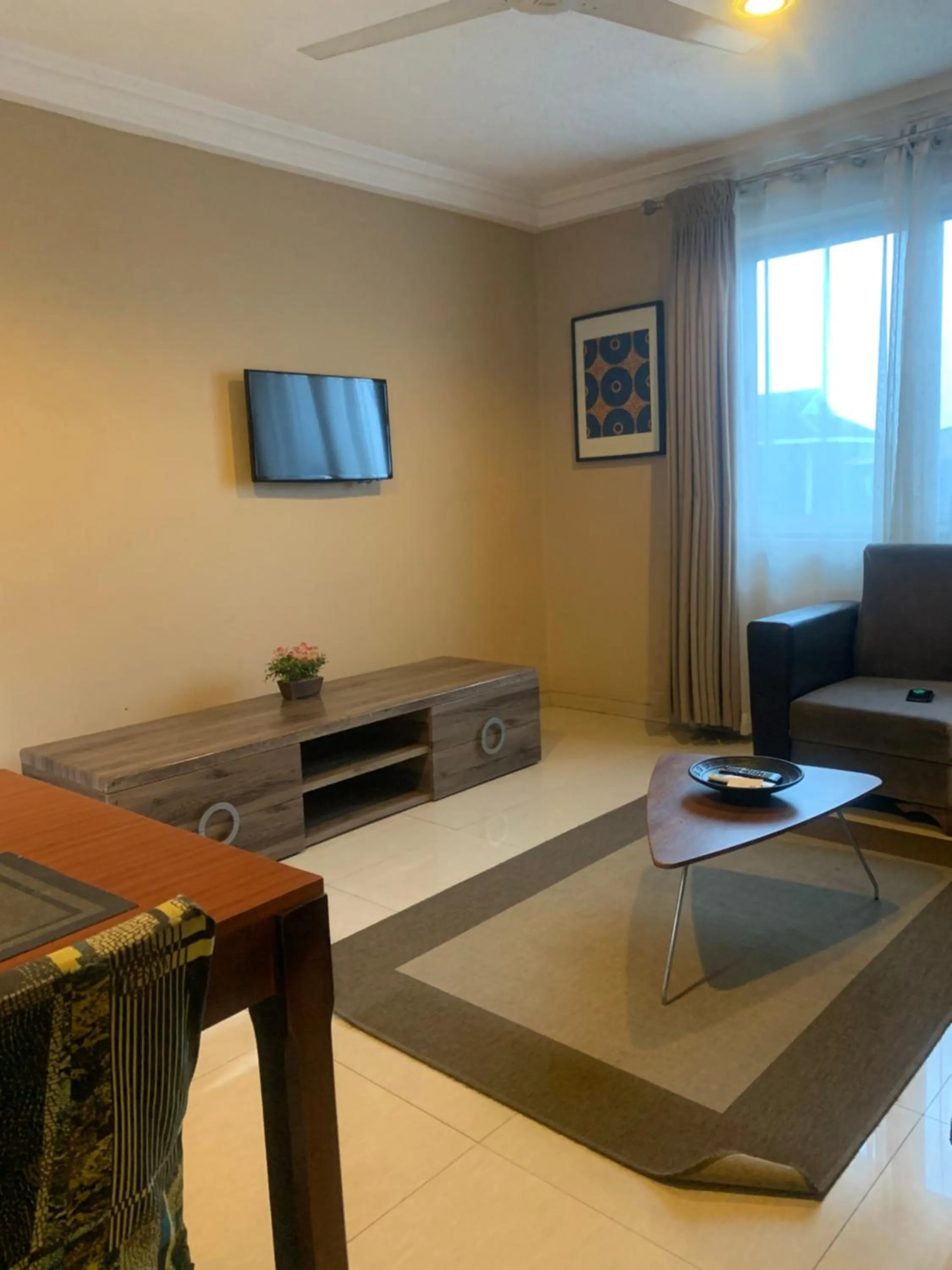 Communal lounge/ TV room in Manjaro Suites