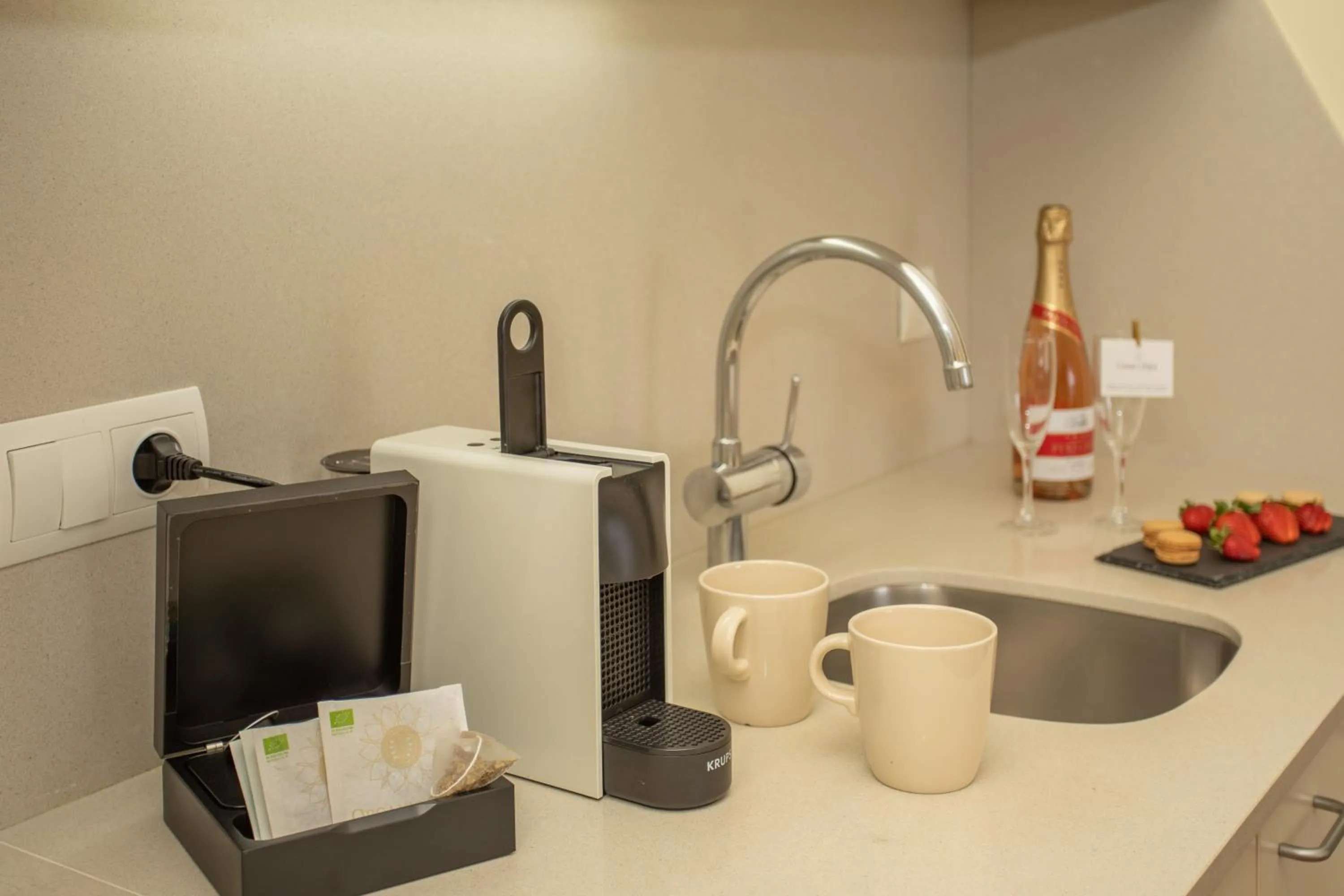 Kitchen or kitchenette in Aparthotel Ciutat de Palol