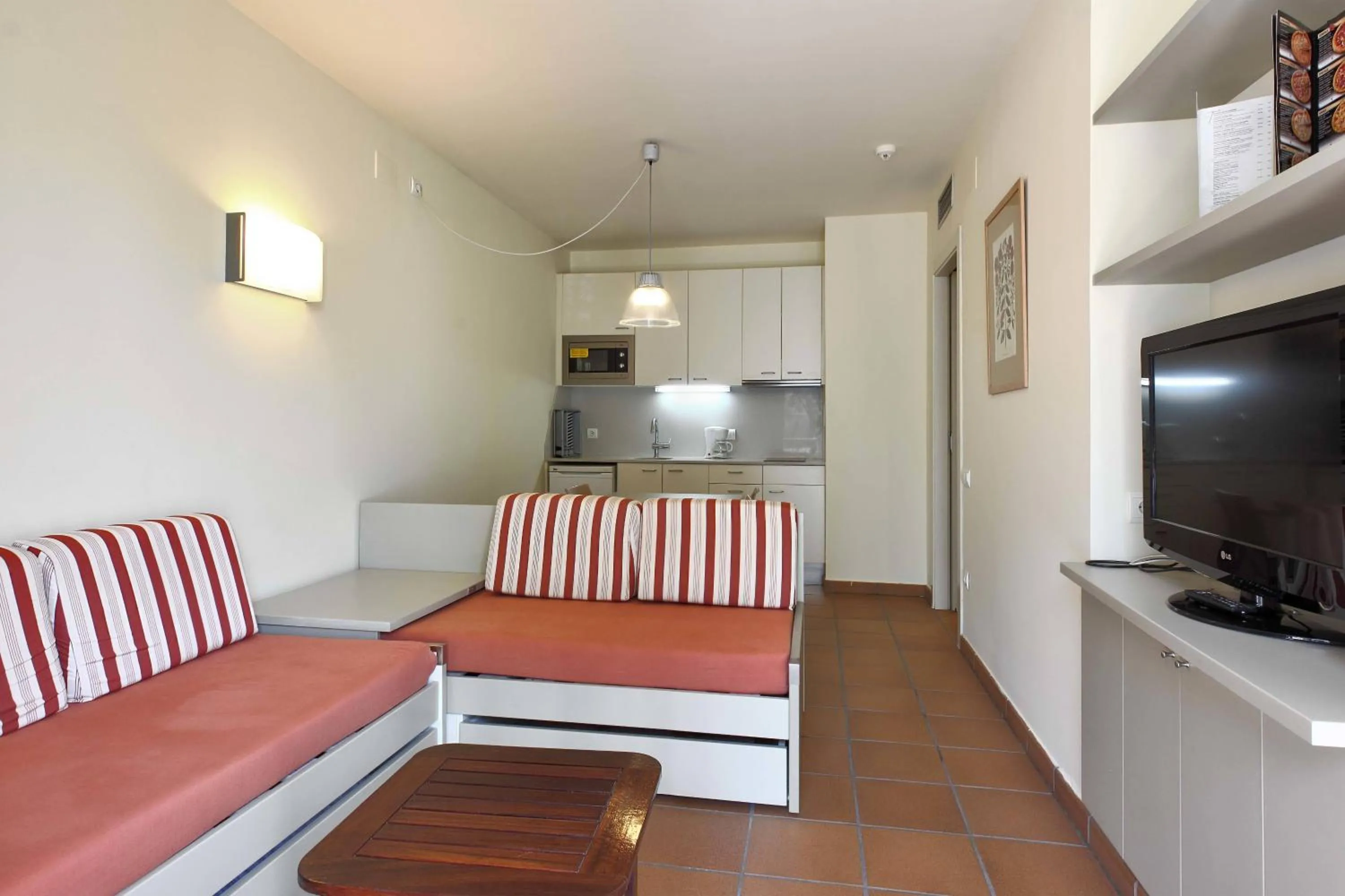 Living room in Aparthotel Ciutat de Palol