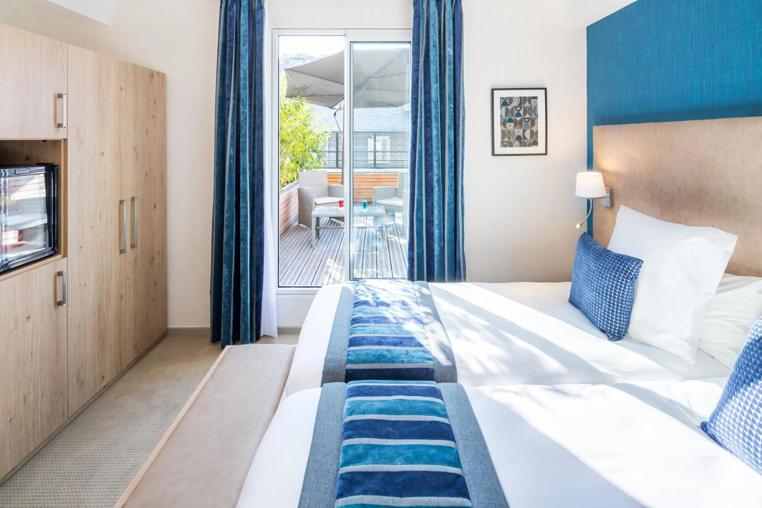 Bed in Hôtel Le Rive Droite & SPA