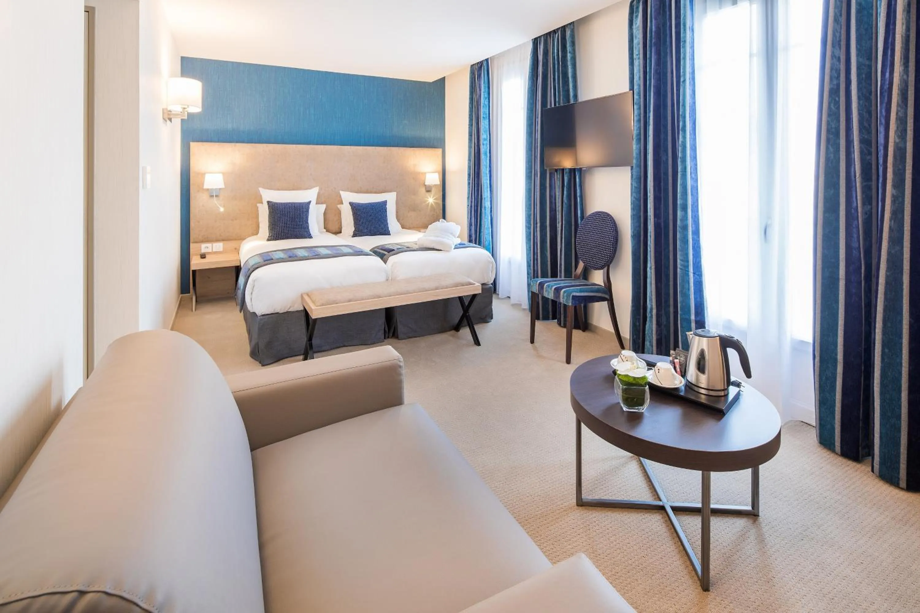 Bed in Hôtel Le Rive Droite & SPA