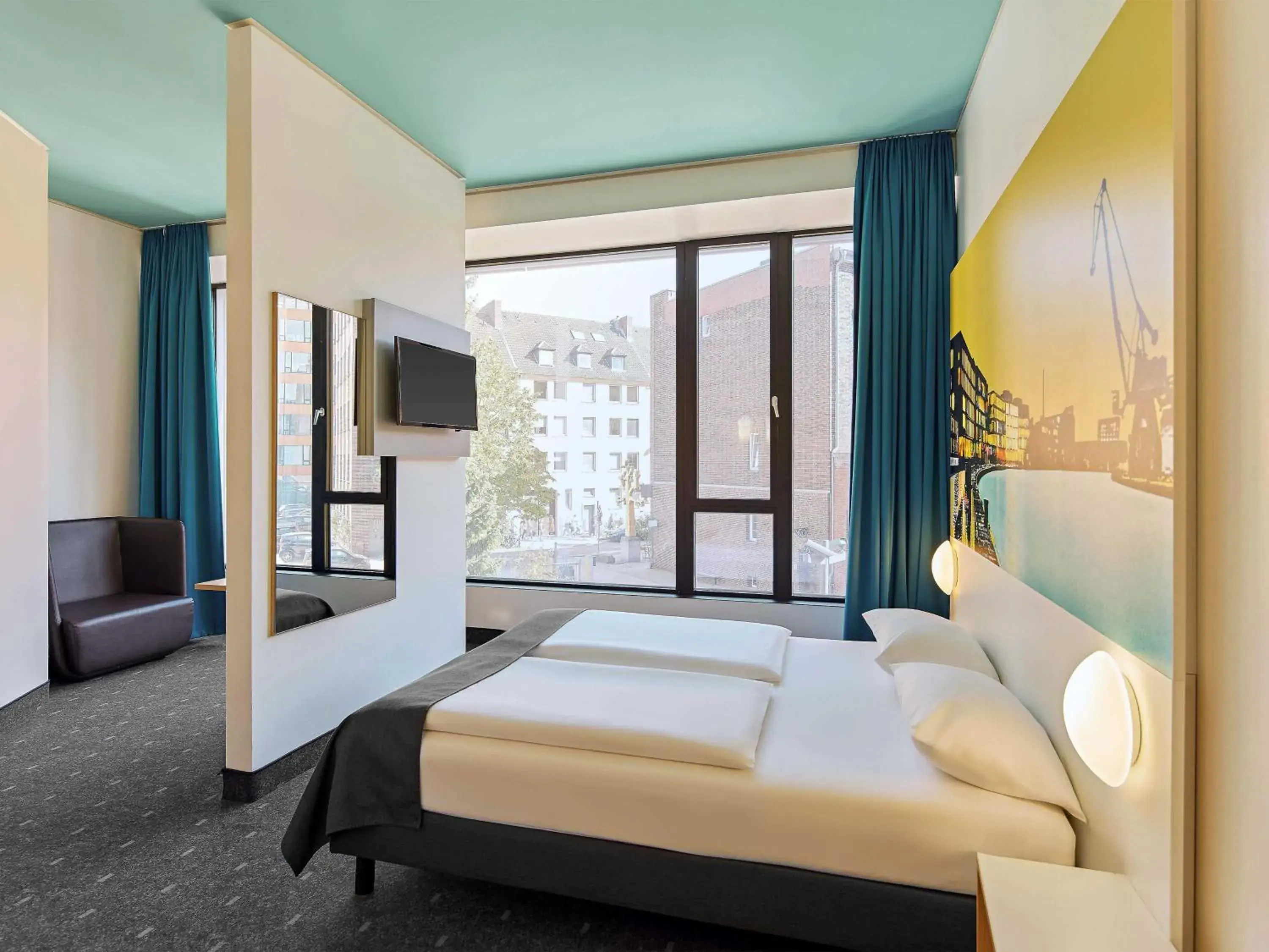 Photo of the whole room, Bed in B&B HOTEL Münster Hafen Photo of the whole room, Bed in B&B HOTEL Münster Hafen