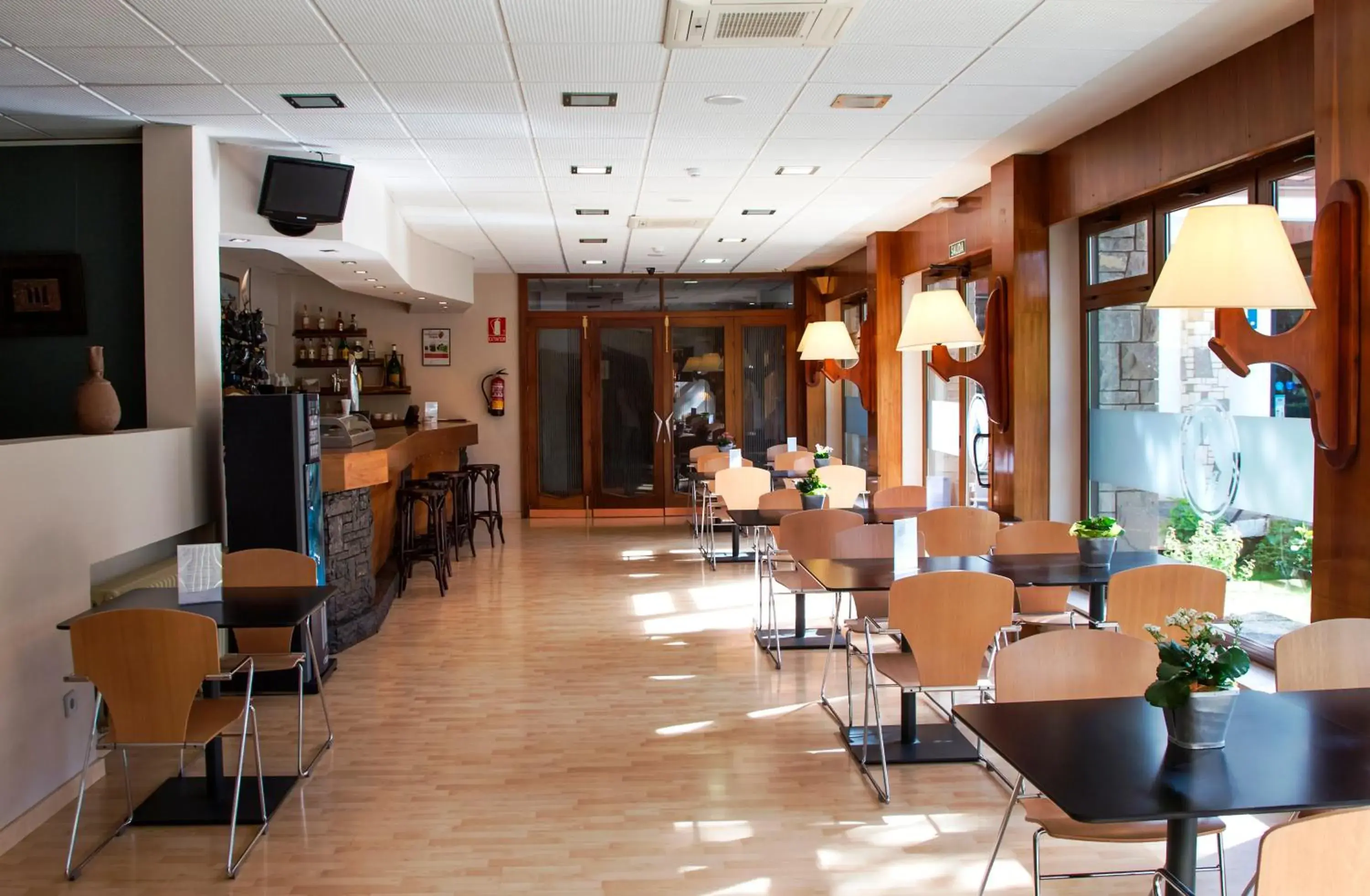 Lounge or bar in Silken Ordesa Lounge or bar in Silken Ordesa