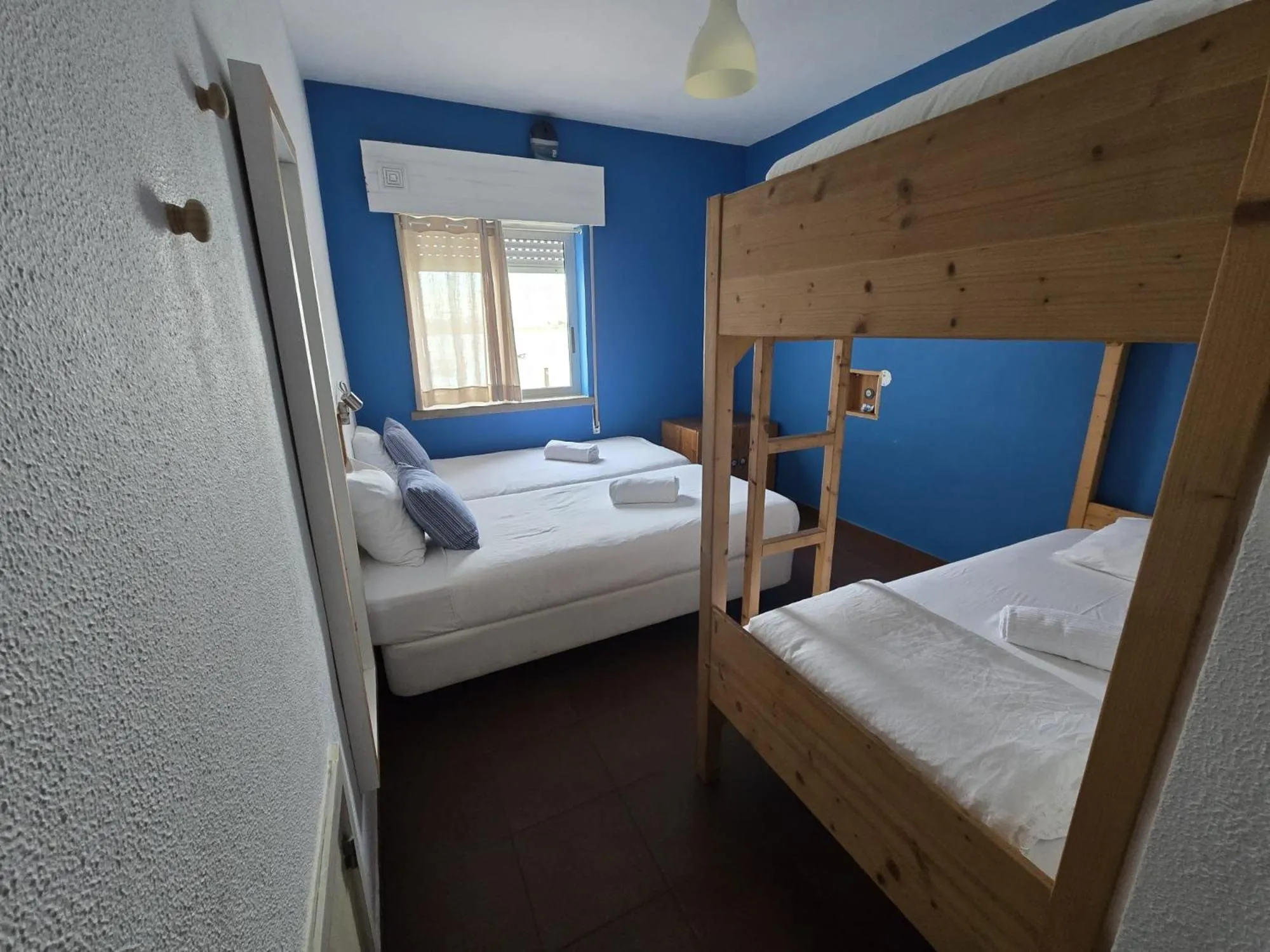 Quadruple Room with Private Bathroom in Wax Hostel