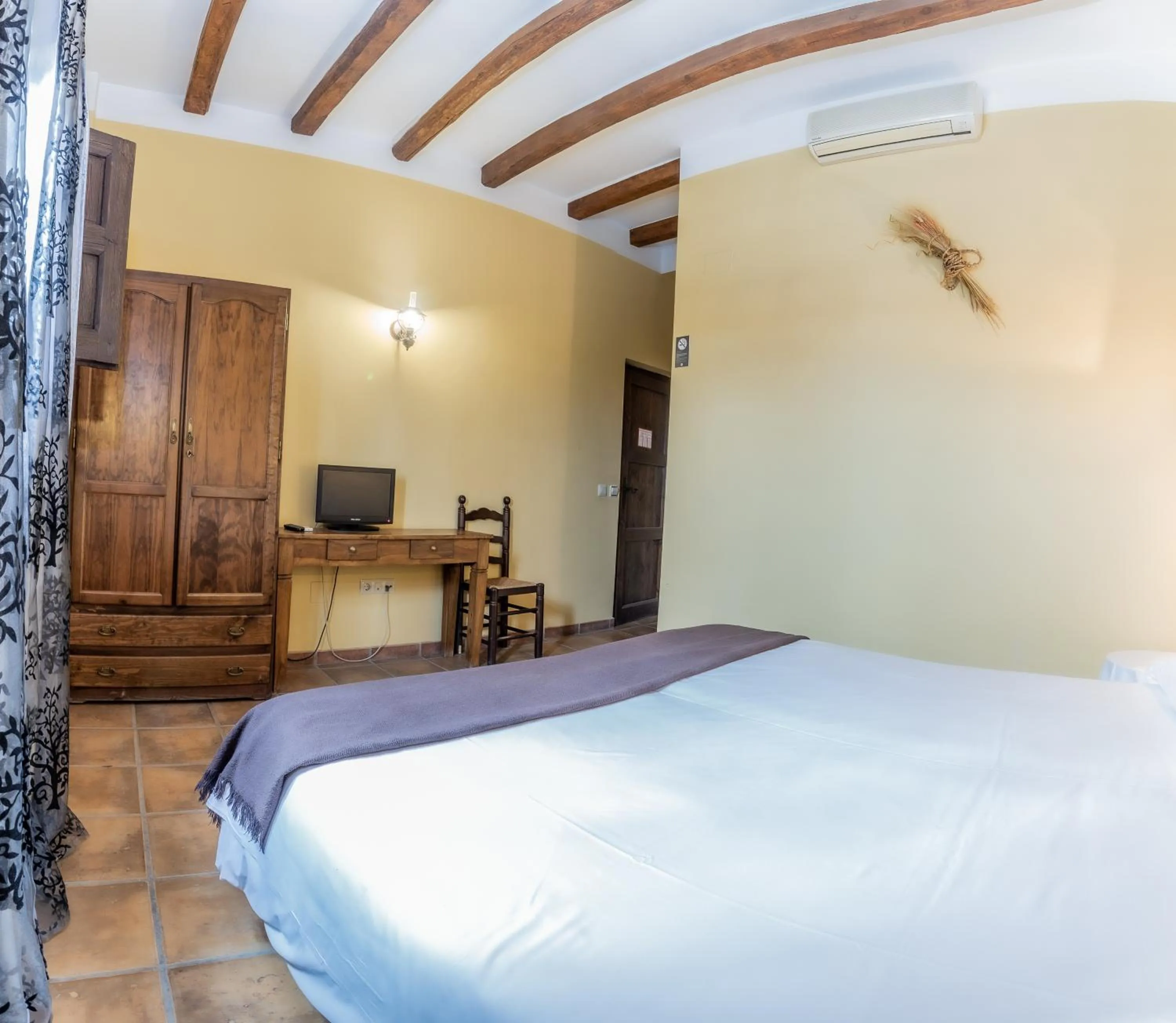 Bed in Hosteria Tierrallana by Juypehotel