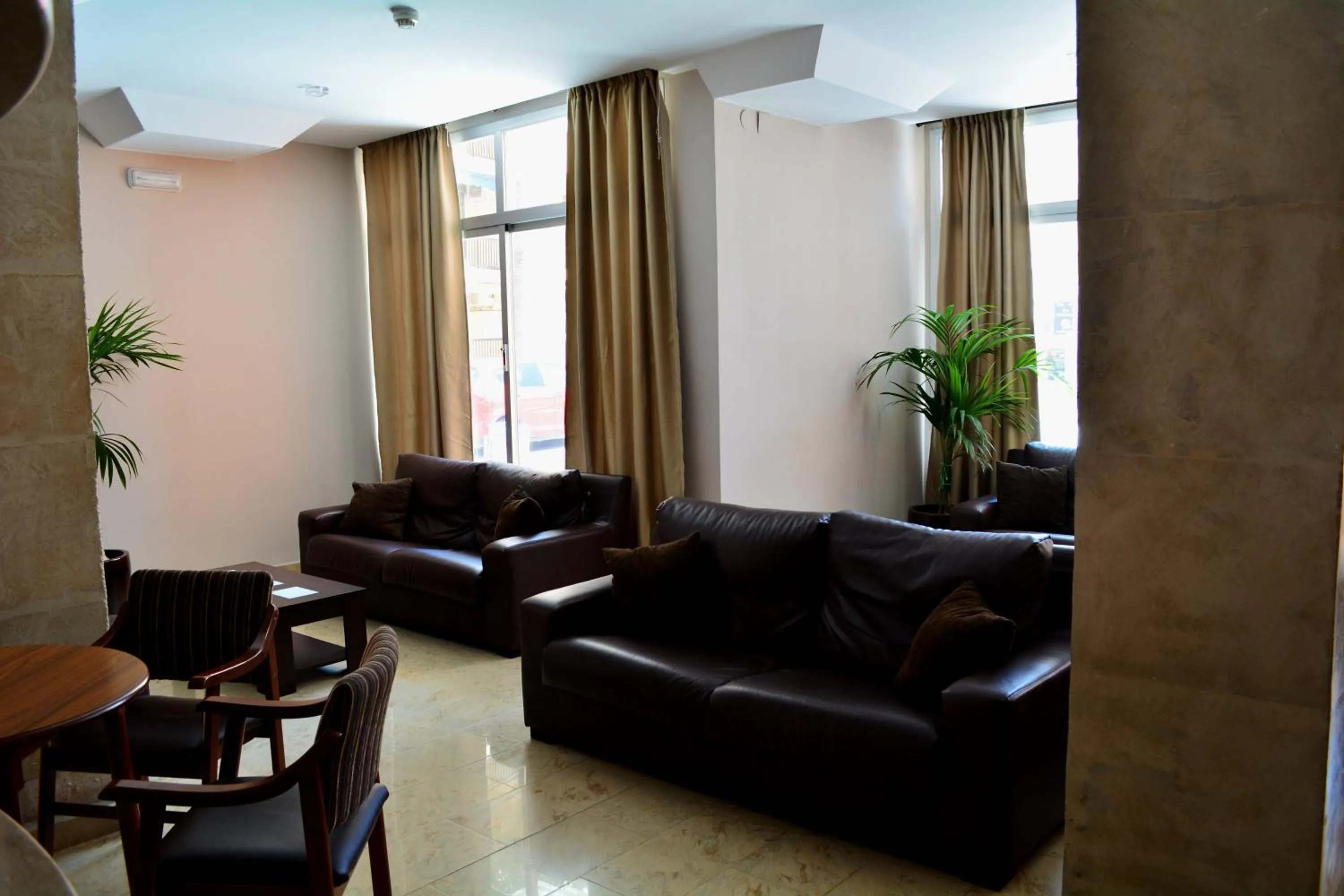 Communal lounge/ TV room in Hotel L'Escala