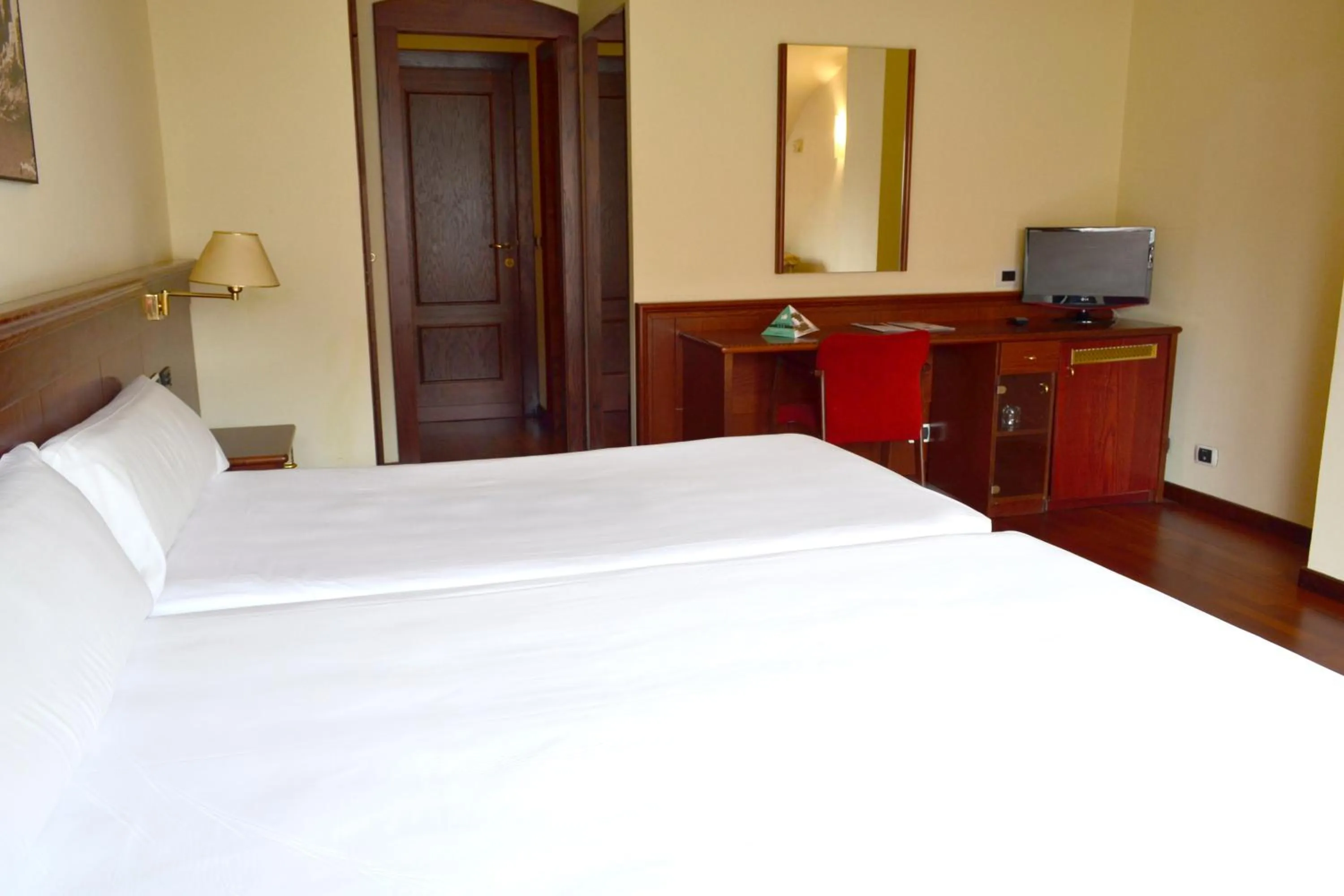 Bed in Hotel Alda El Suizo