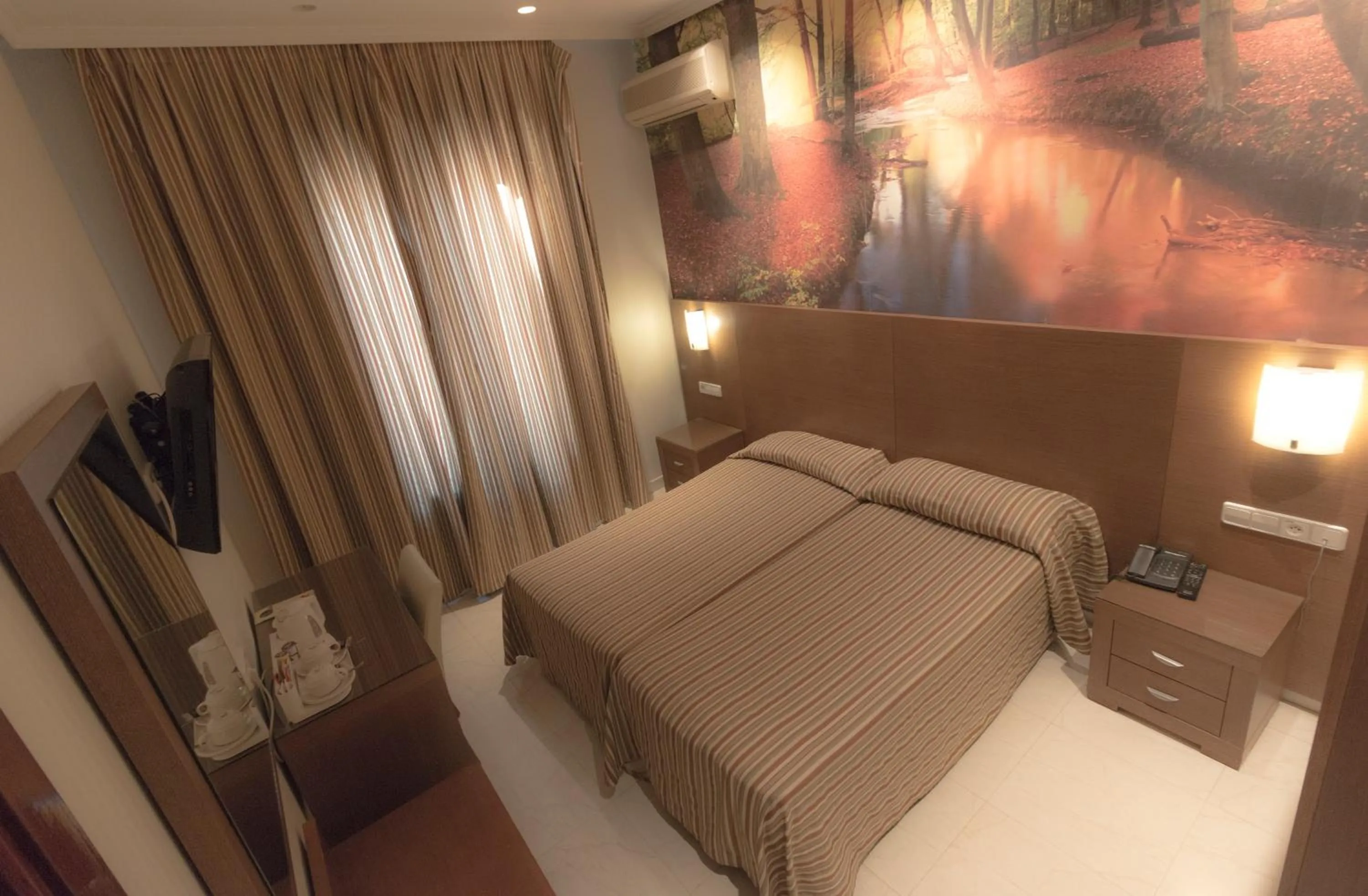 Bed in Hostal Atocha Almudena Martín