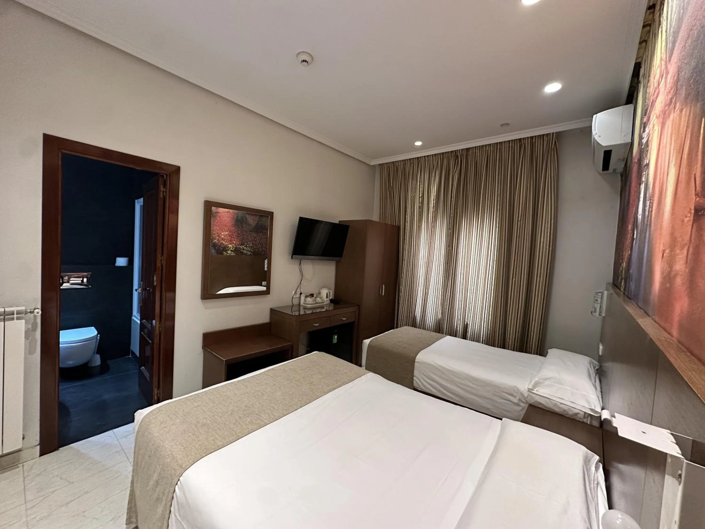 Bed in Hostal Atocha Almudena Martín