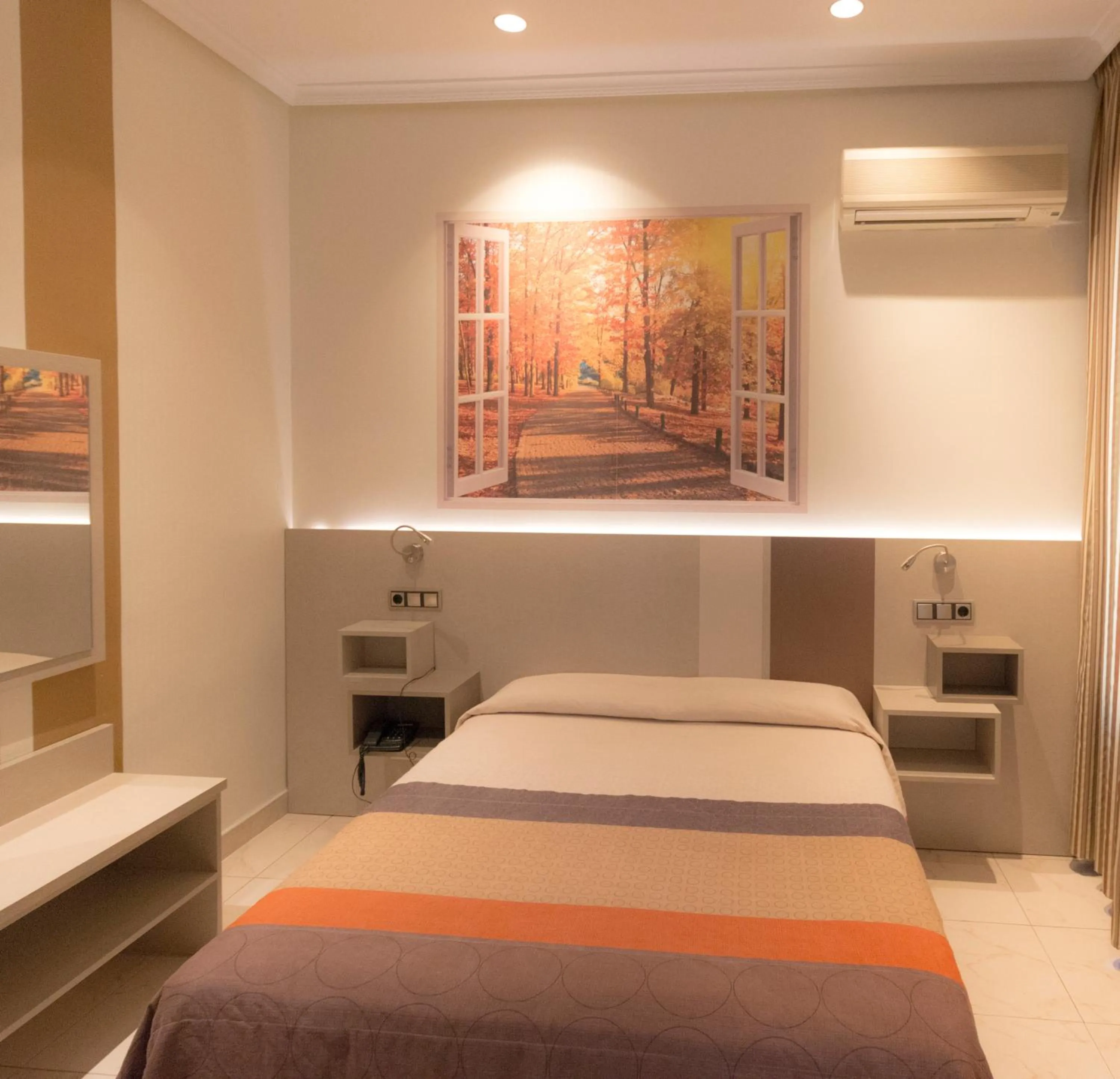 Bed in Hostal Atocha Almudena Martín