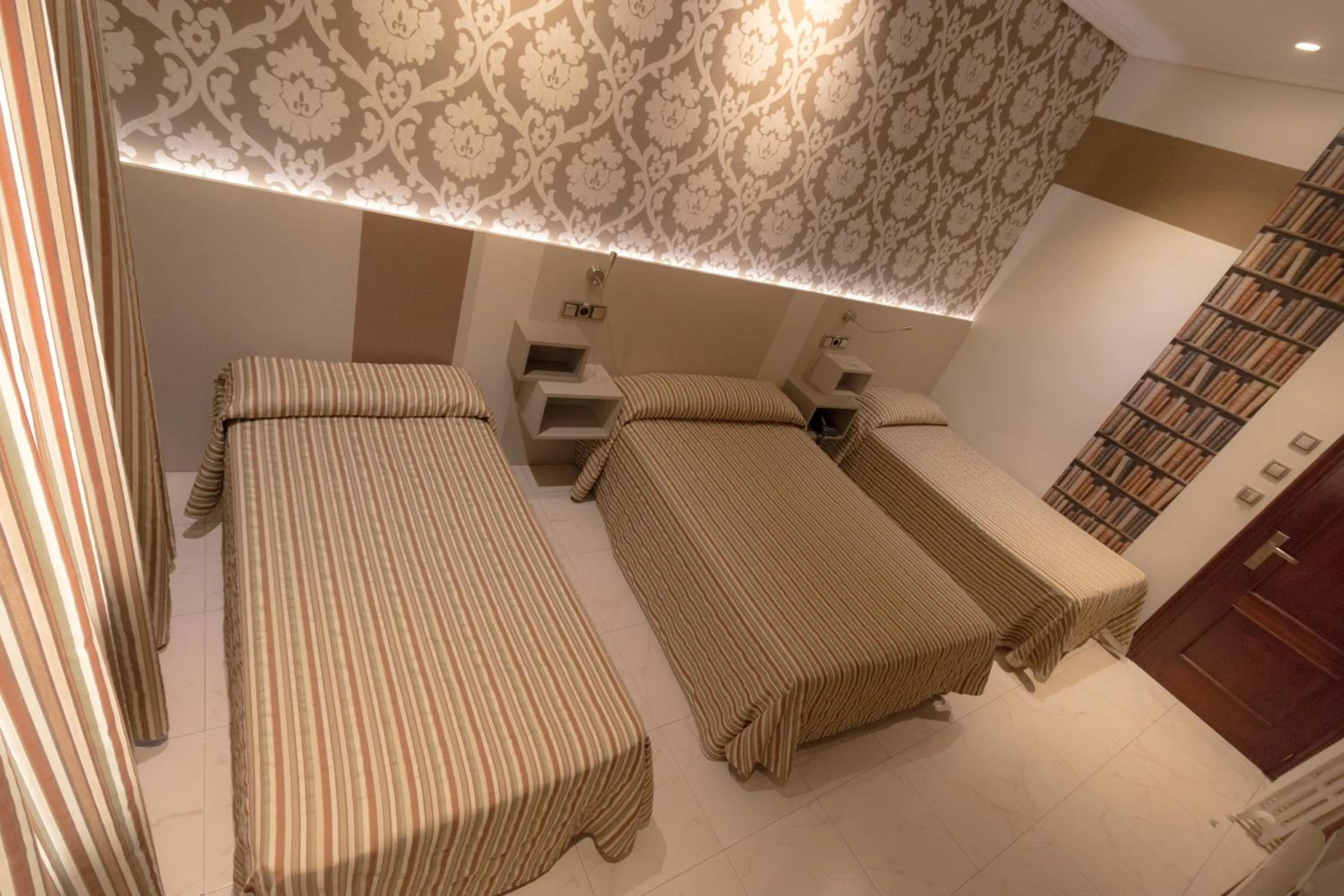 Bed in Hostal Atocha Almudena Martín