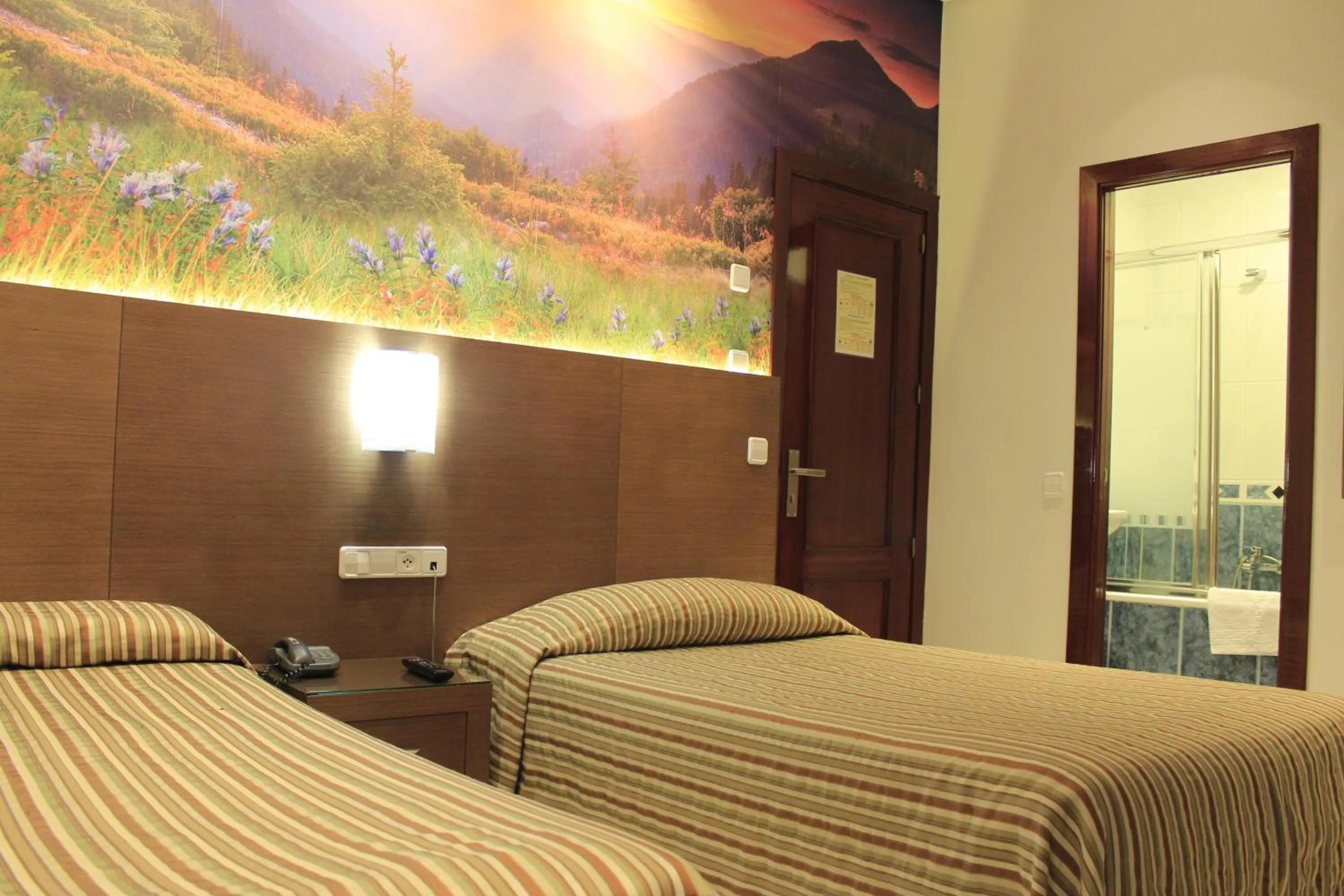 Bed in Hostal Atocha Almudena Martín