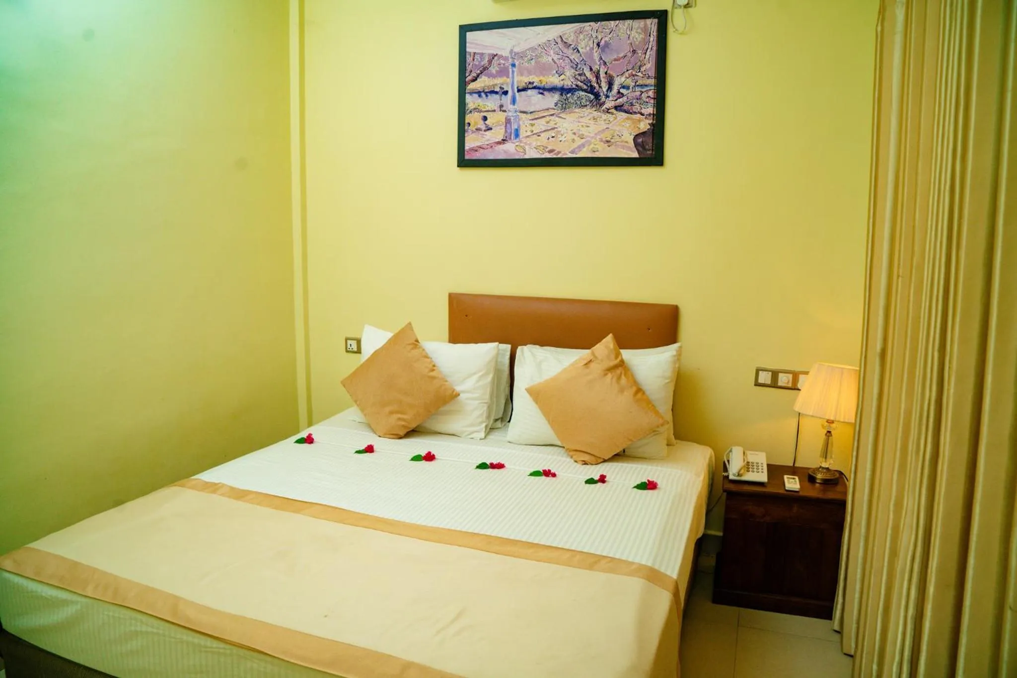 Bed in Sungreen Resort Habarana