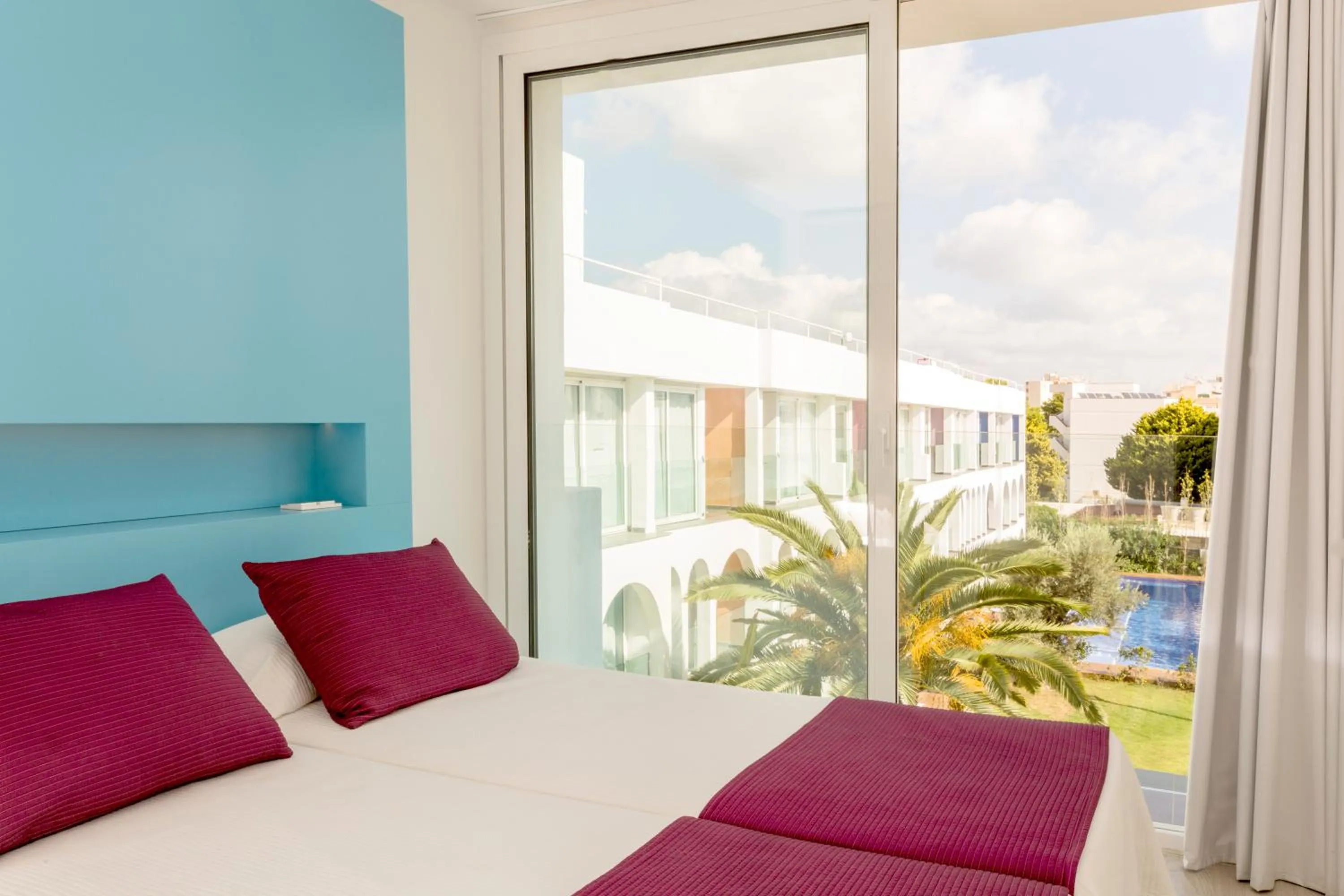 Pool view, Bed in Ebano Hotel Apartments & Spa