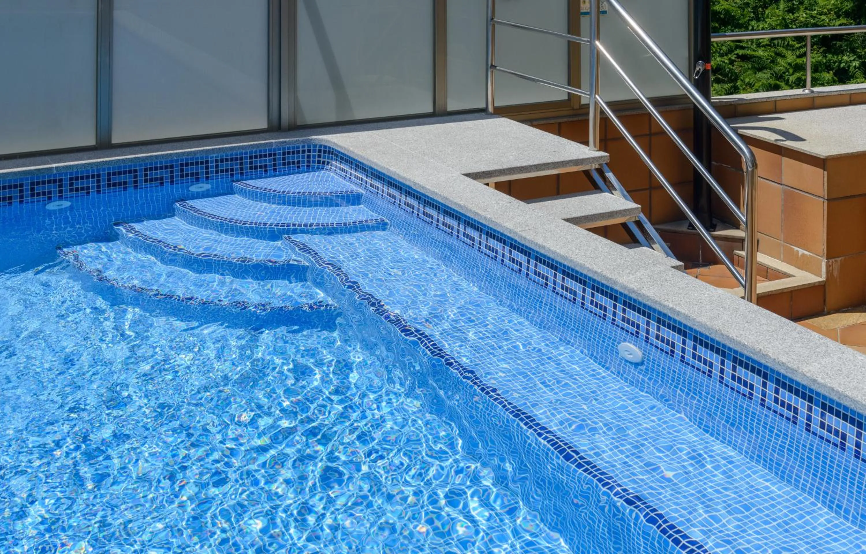 Swimming pool in Apartamentos Trisquel