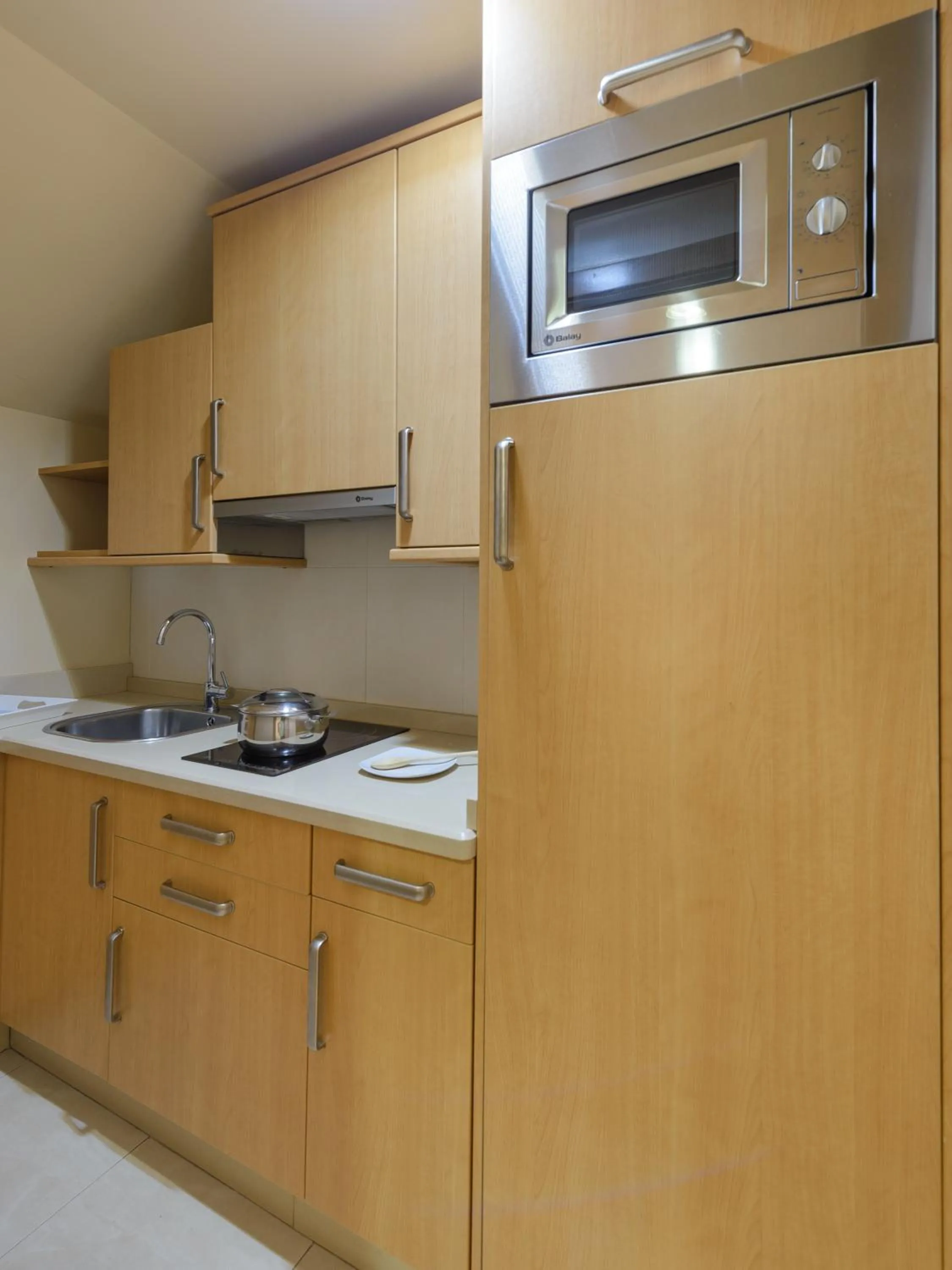Kitchen or kitchenette in Apartamentos Trisquel