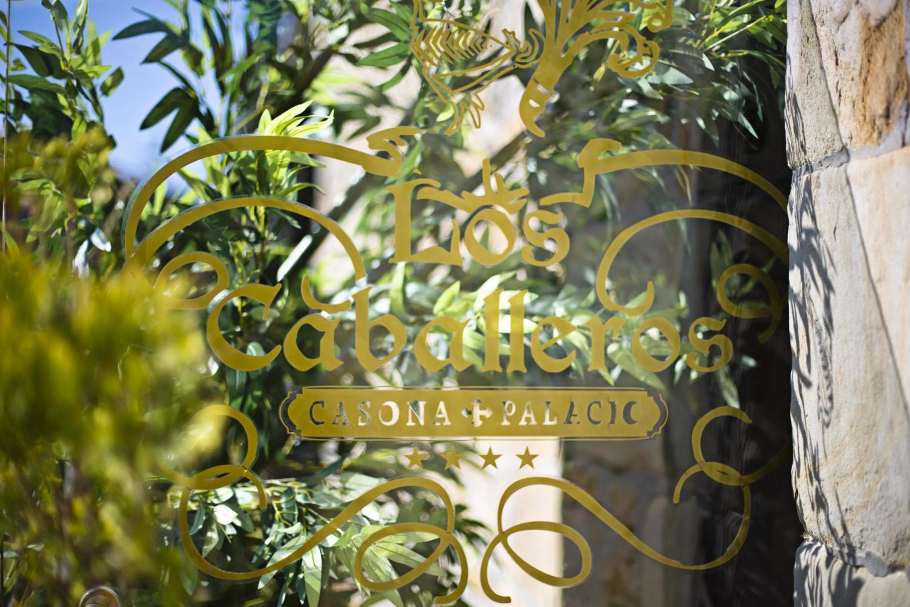 Property logo or sign in Hotel Casona Los Caballeros