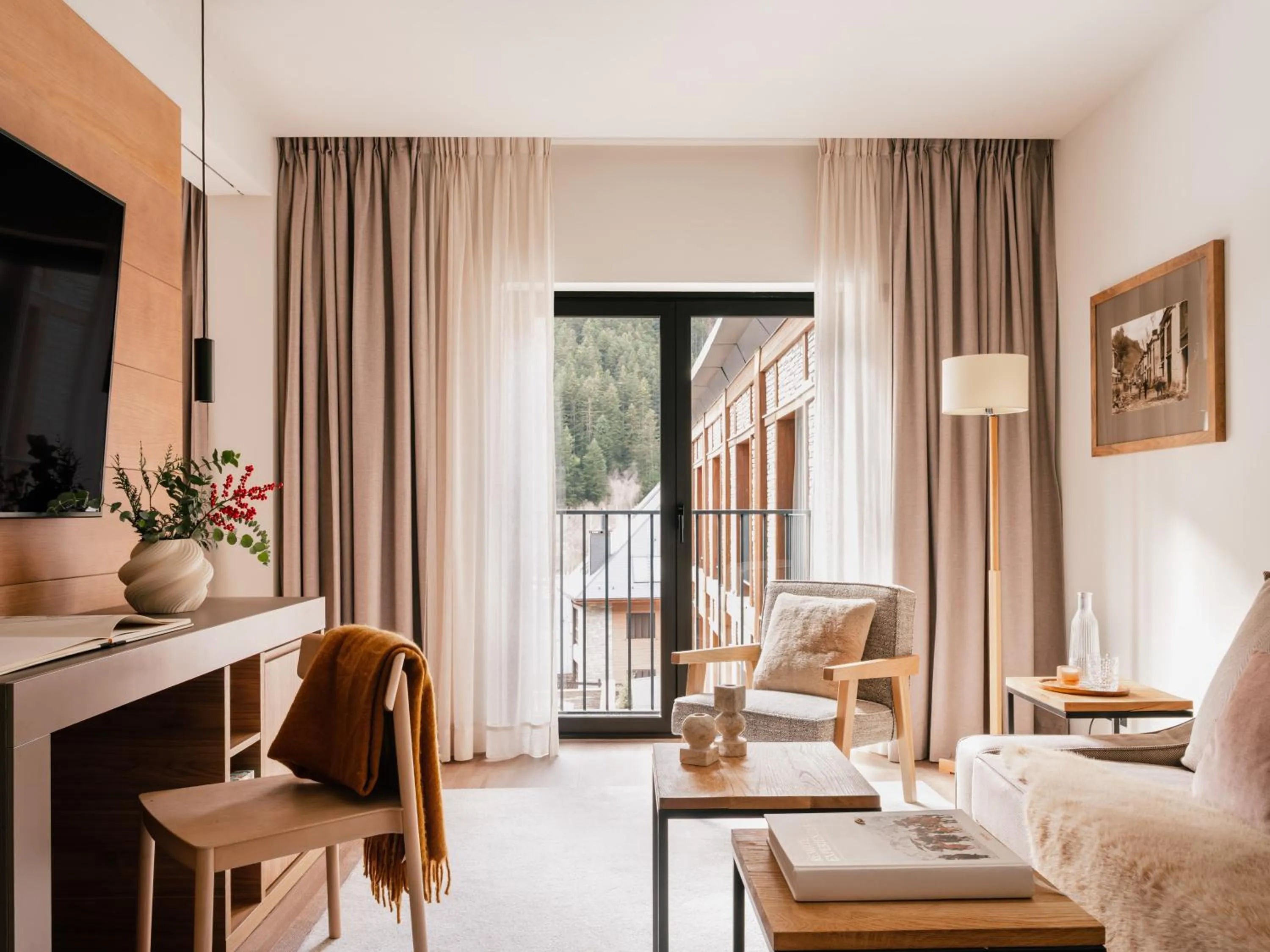 Living room in MIM Baqueira Member of Melia Collection