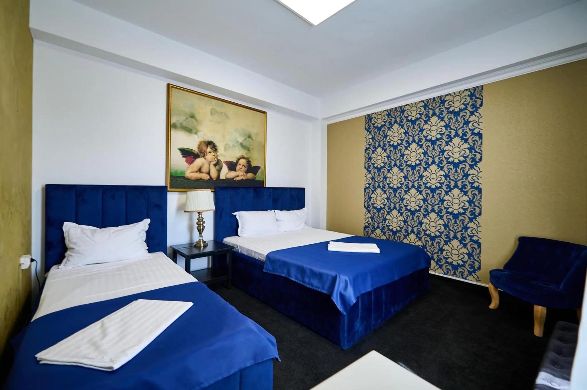 Bed in Hotel Evianne Boutique