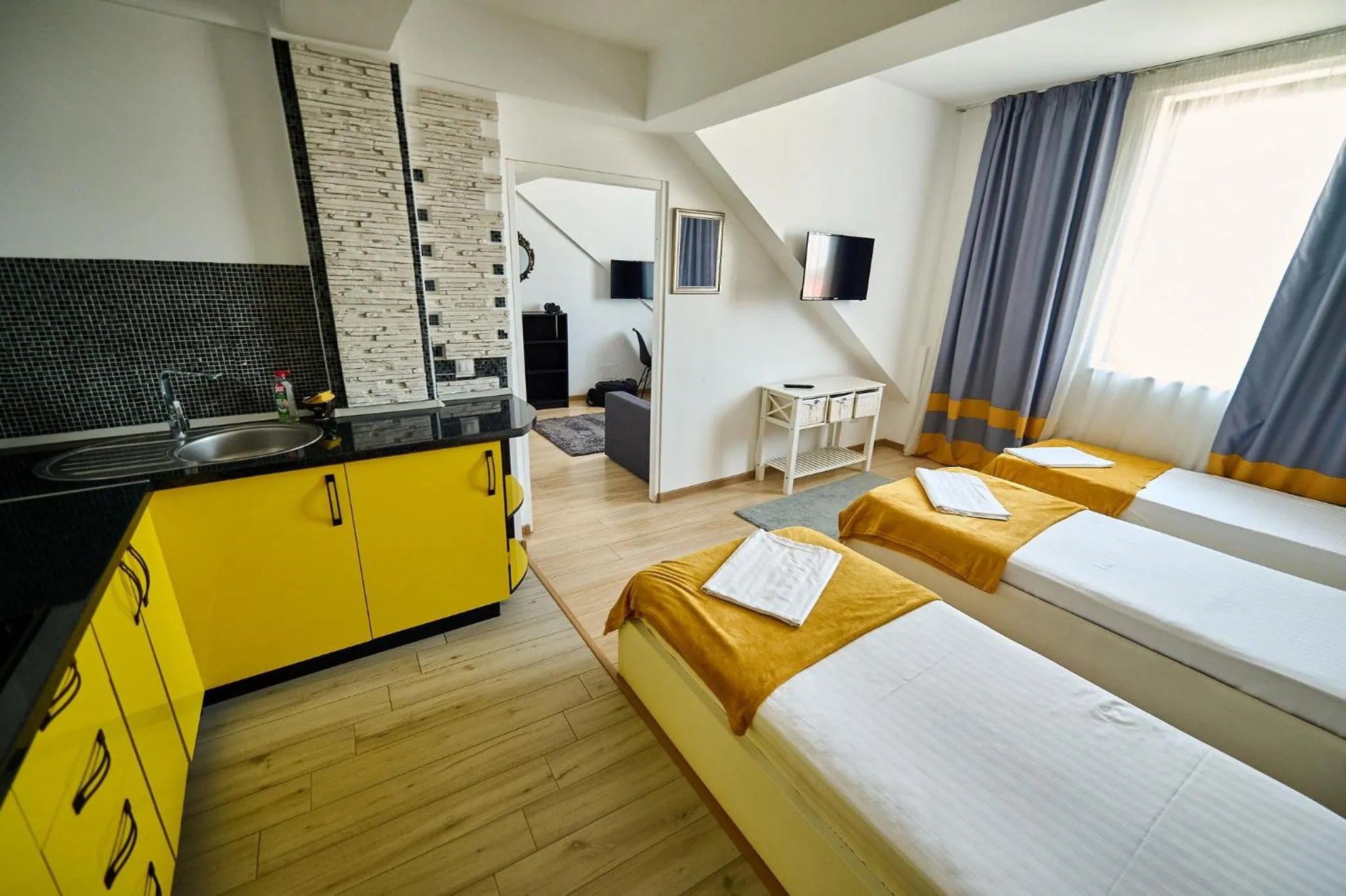 Kitchen or kitchenette, Bed in Hotel Evianne Boutique