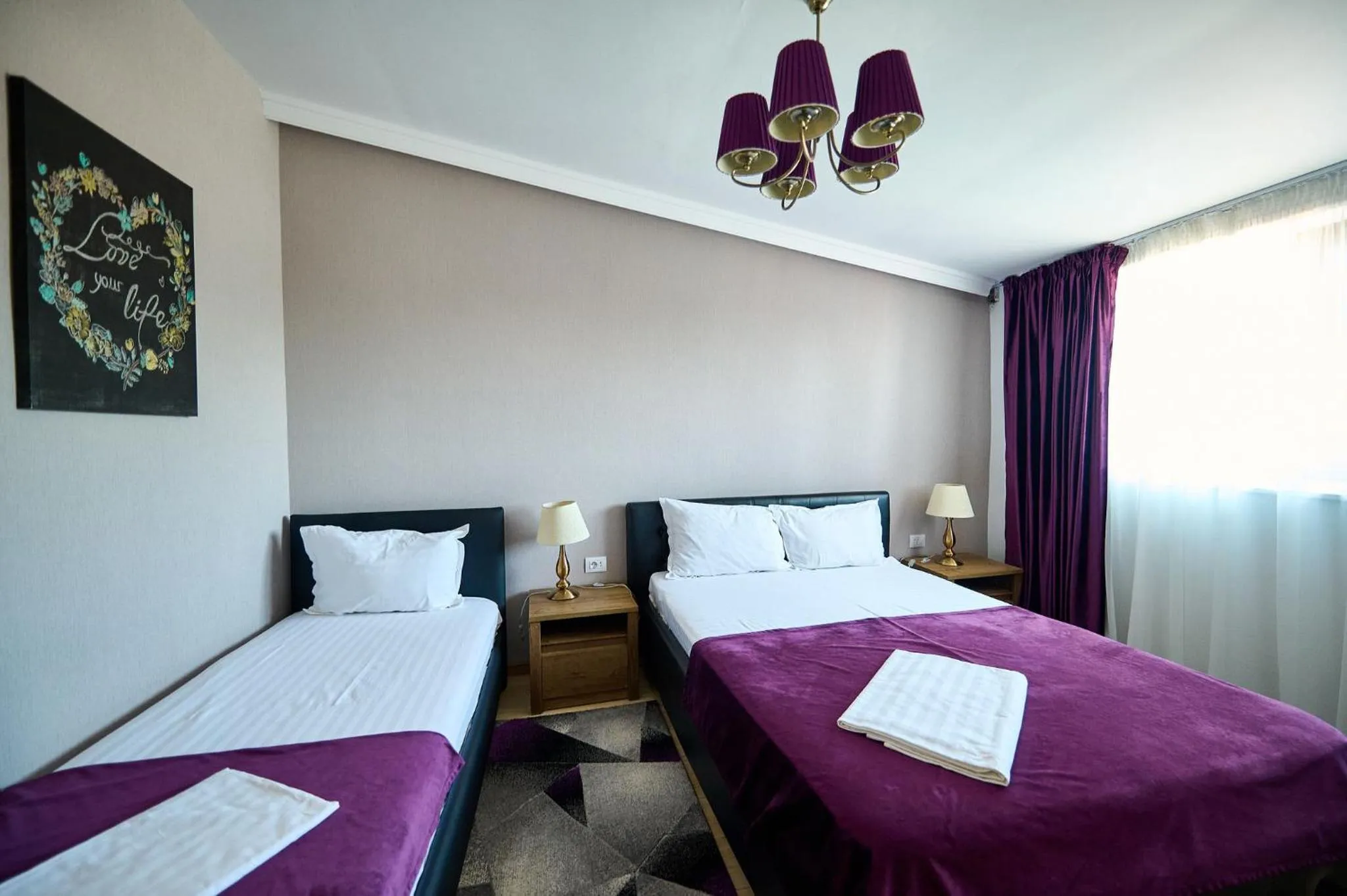 Bed in Hotel Evianne Boutique