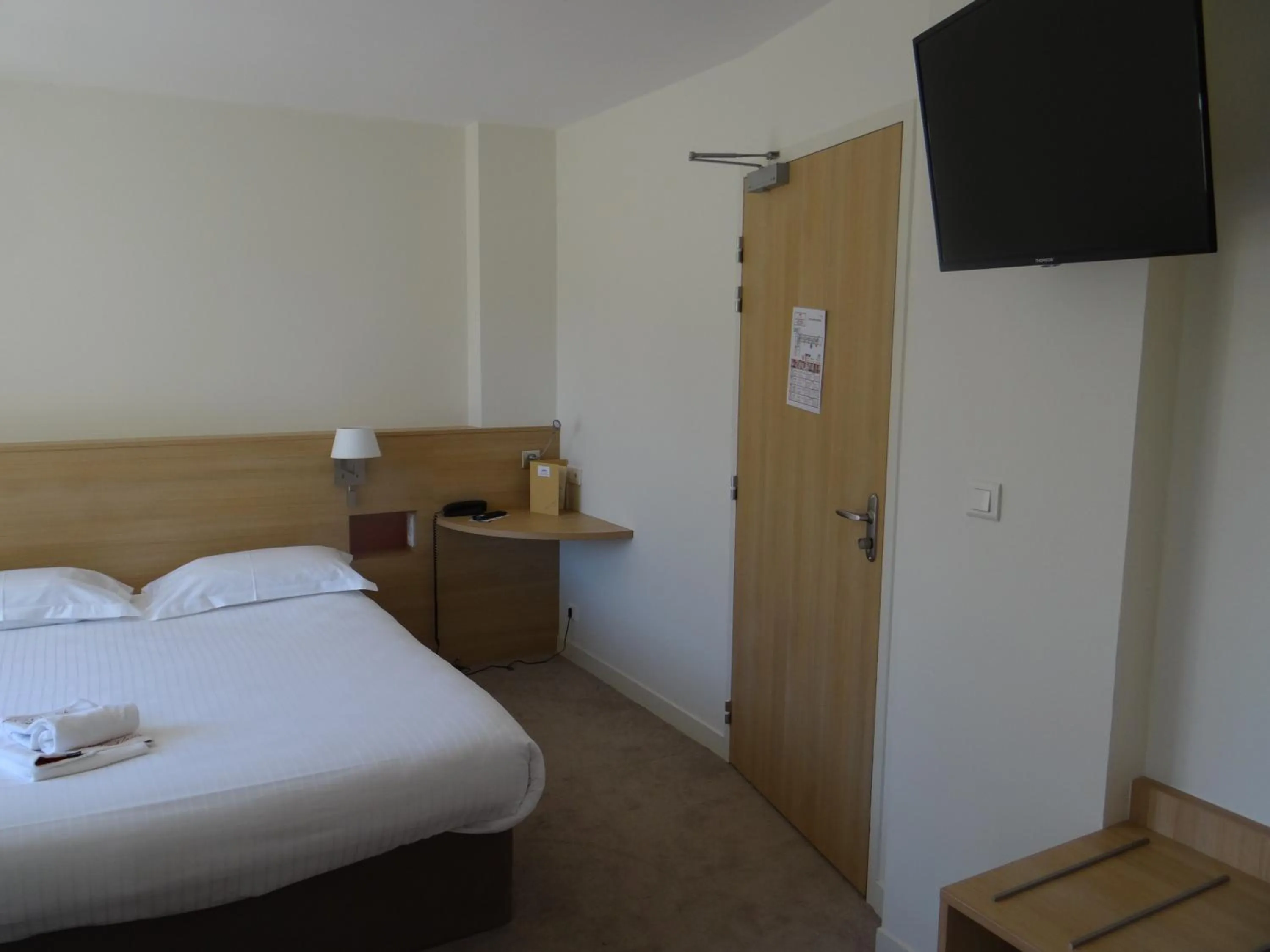 Bed in Hostellerie Bon Pasteur