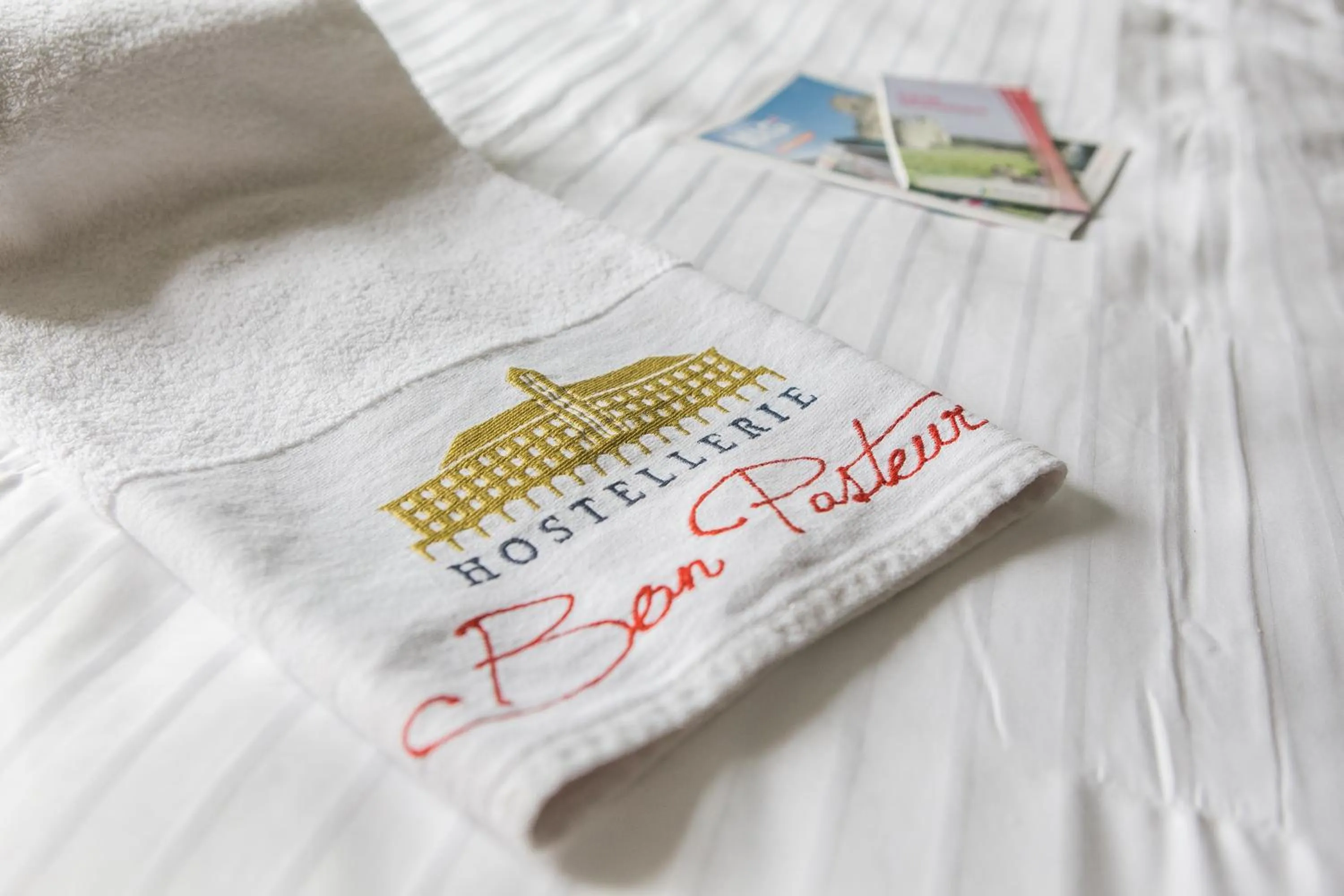 Property logo or sign in Hostellerie Bon Pasteur