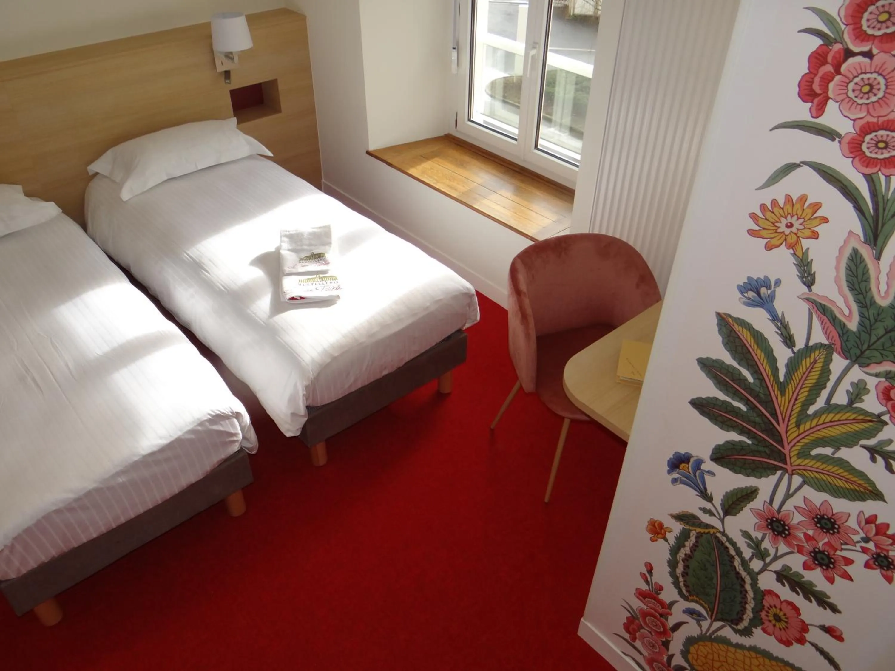 Bed in Hostellerie Bon Pasteur