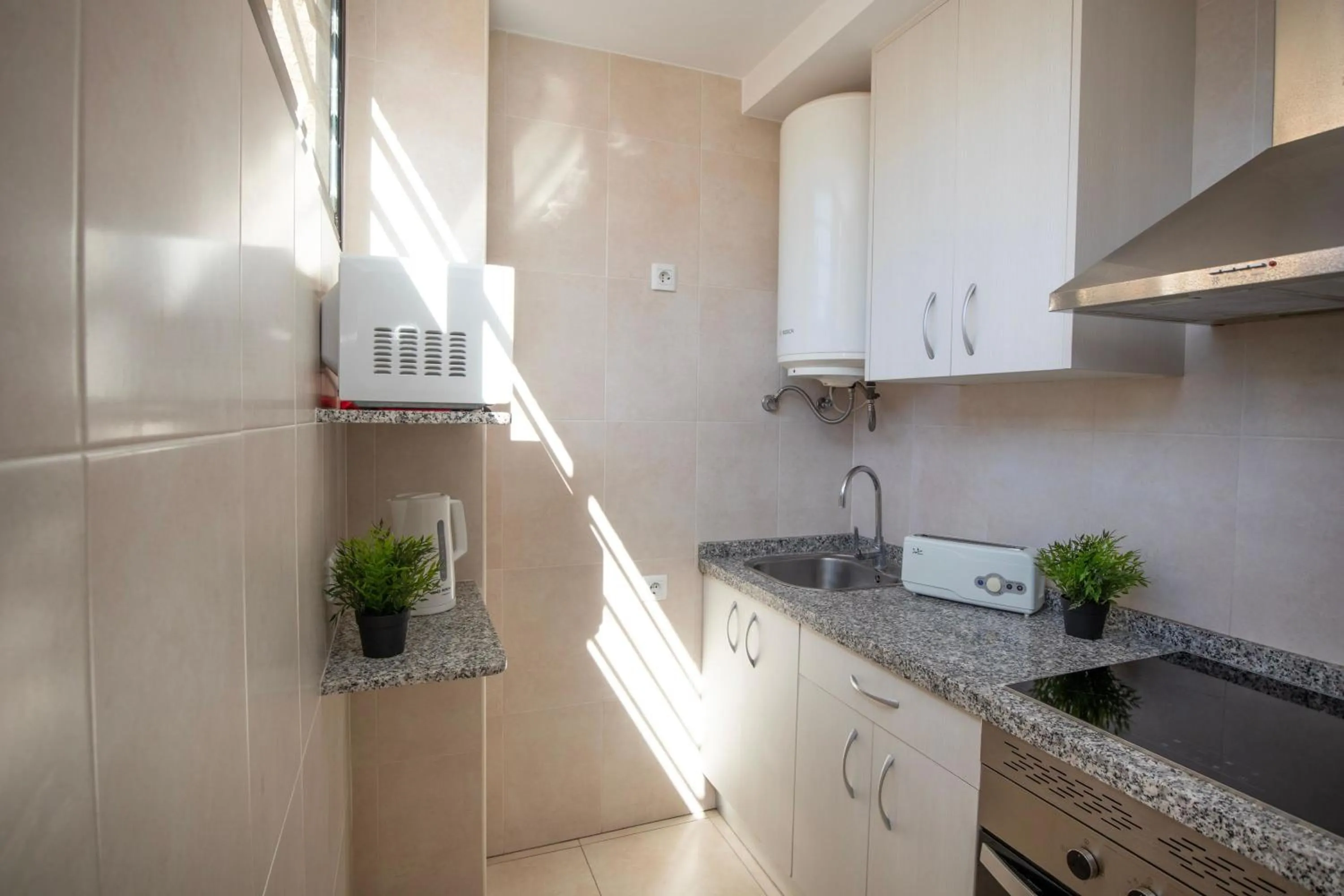 Coffee/tea facilities in Dynastic Rooms Apartments