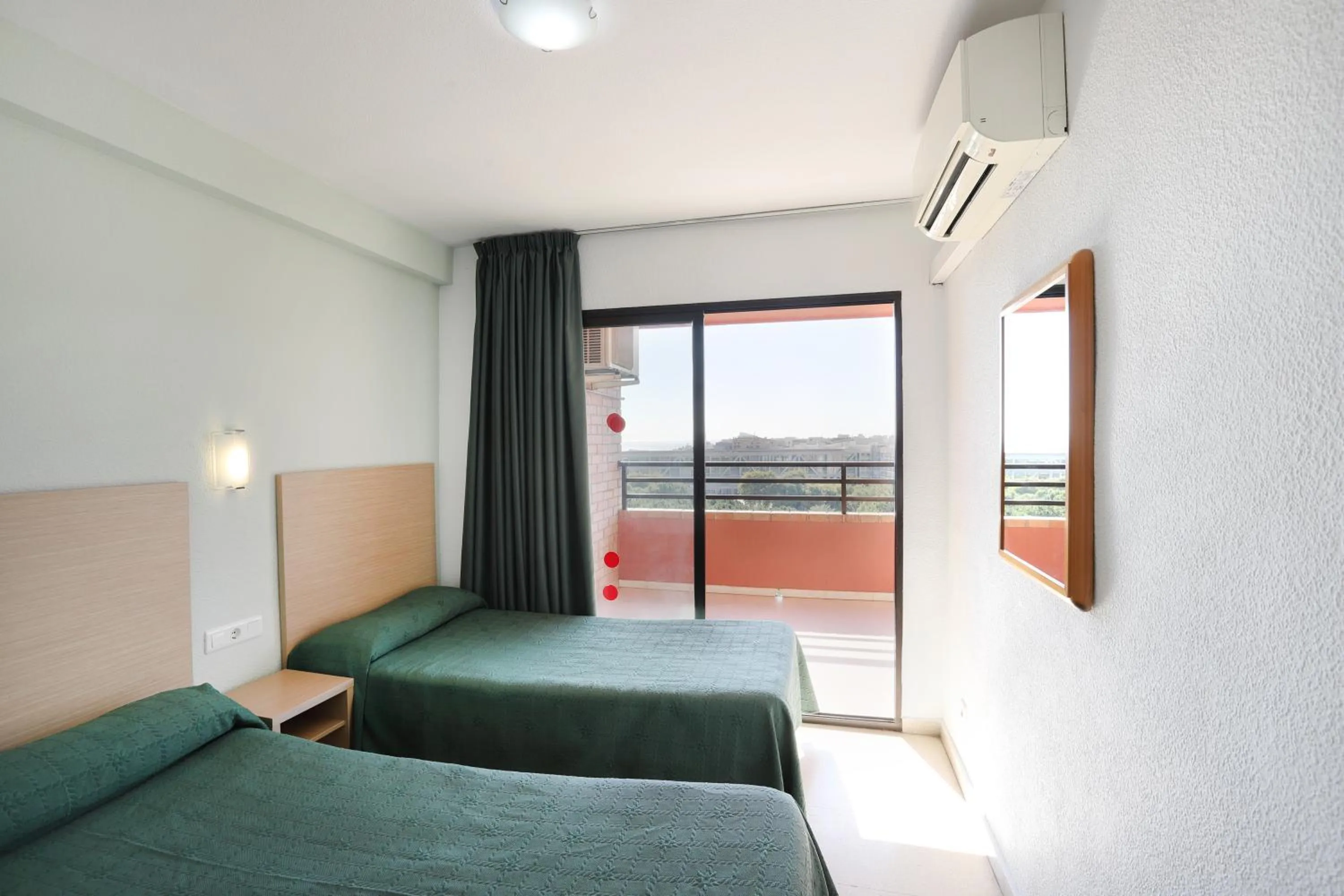 Bed in La Caseta Apartments