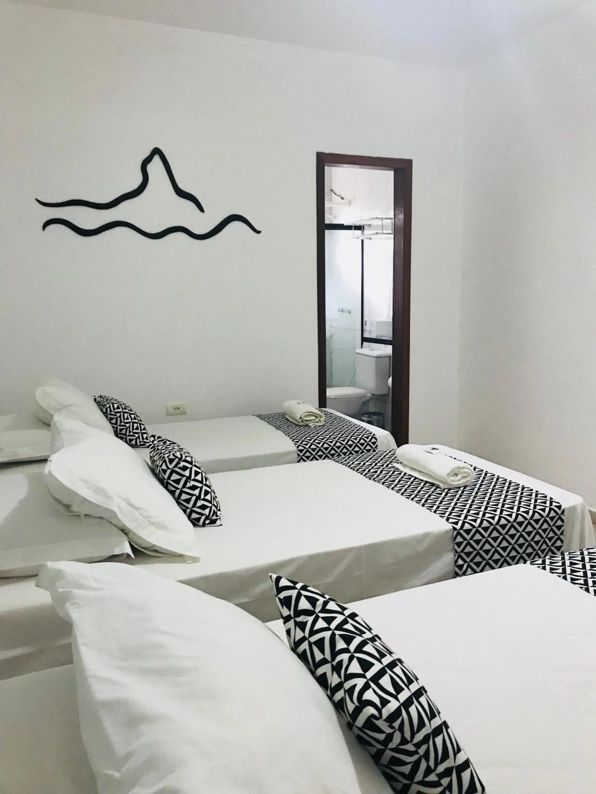 Bed in Pousada Morro do Pico