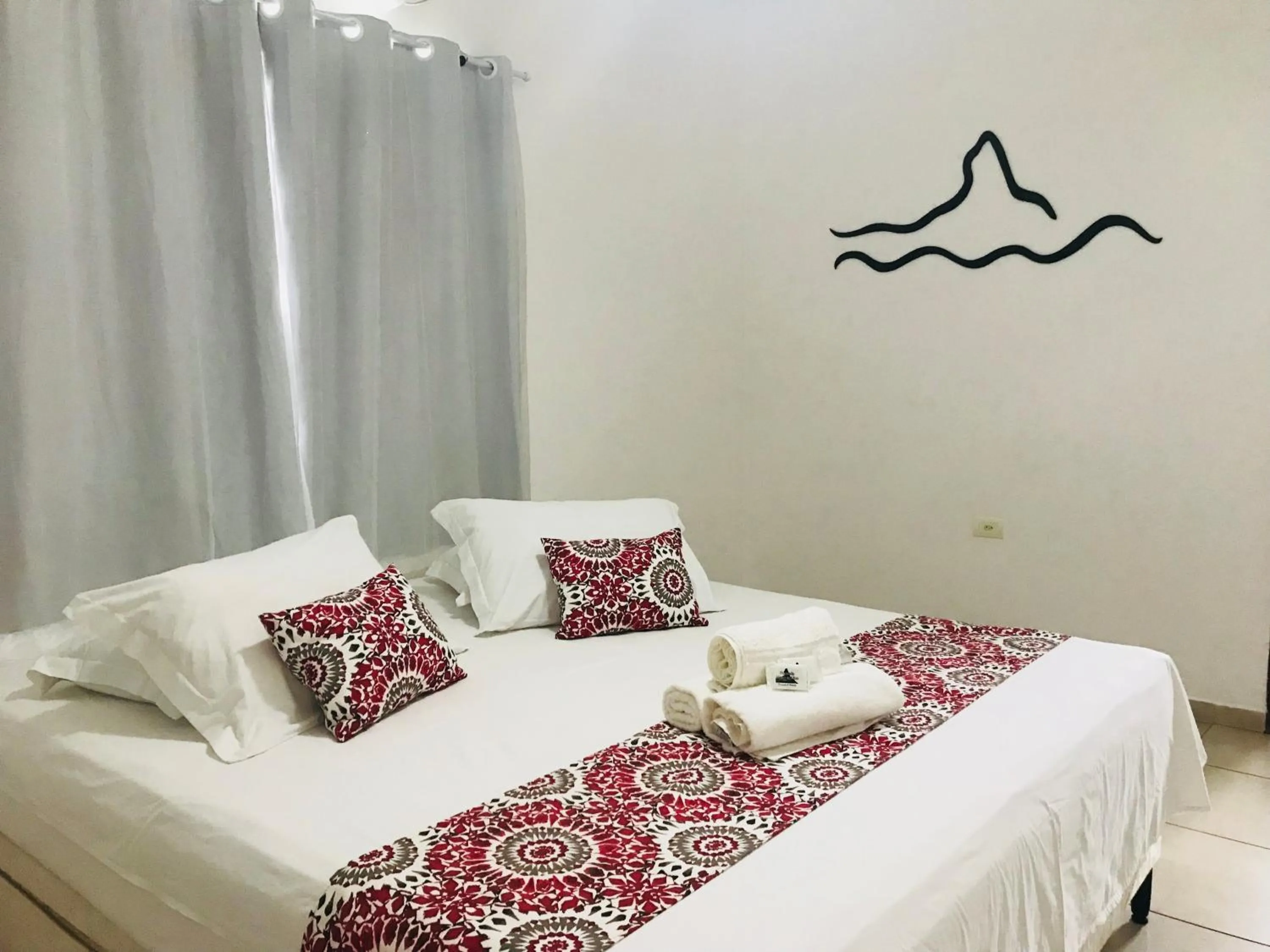 Bed in Pousada Morro do Pico