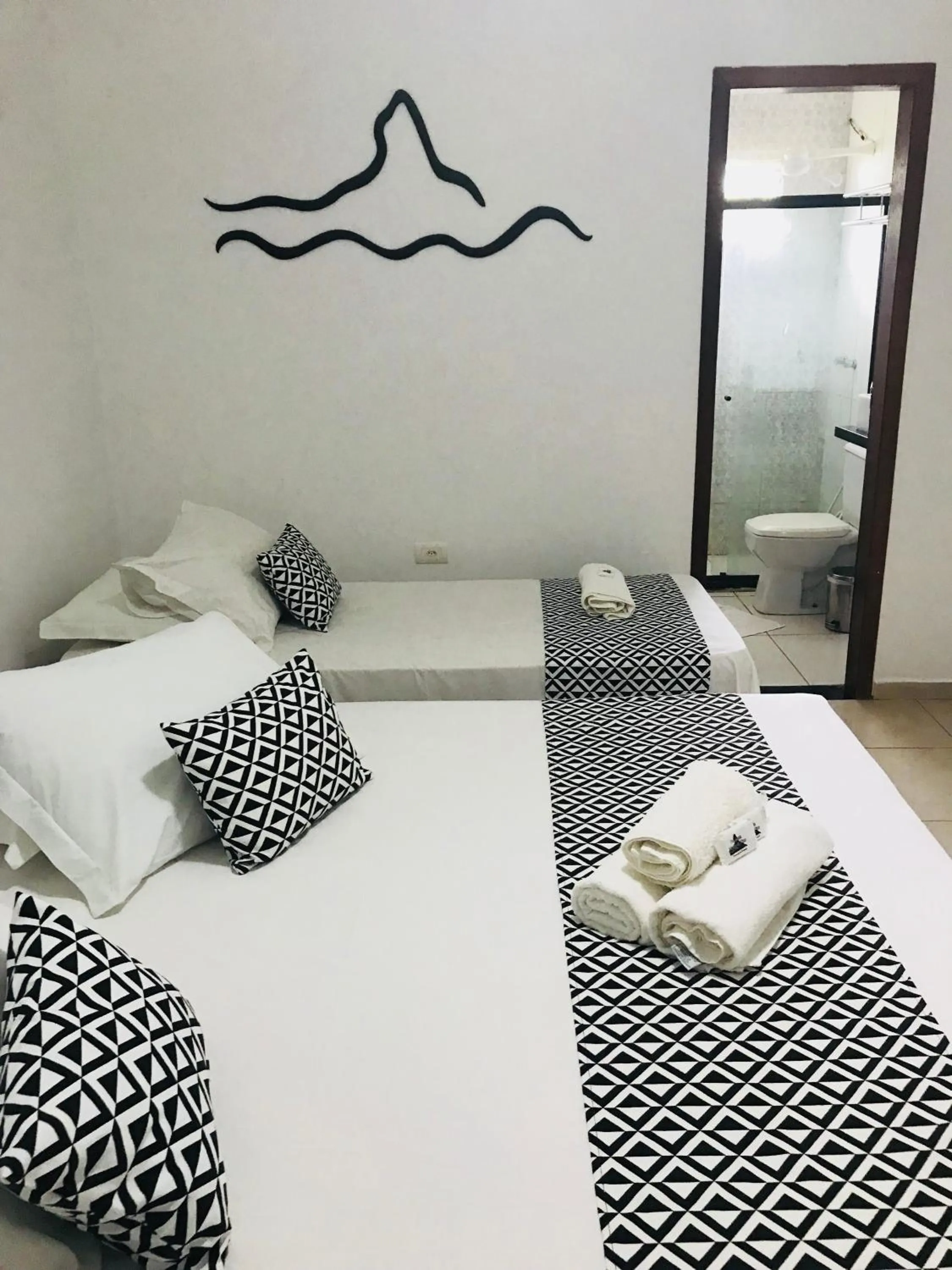 Bed in Pousada Morro do Pico