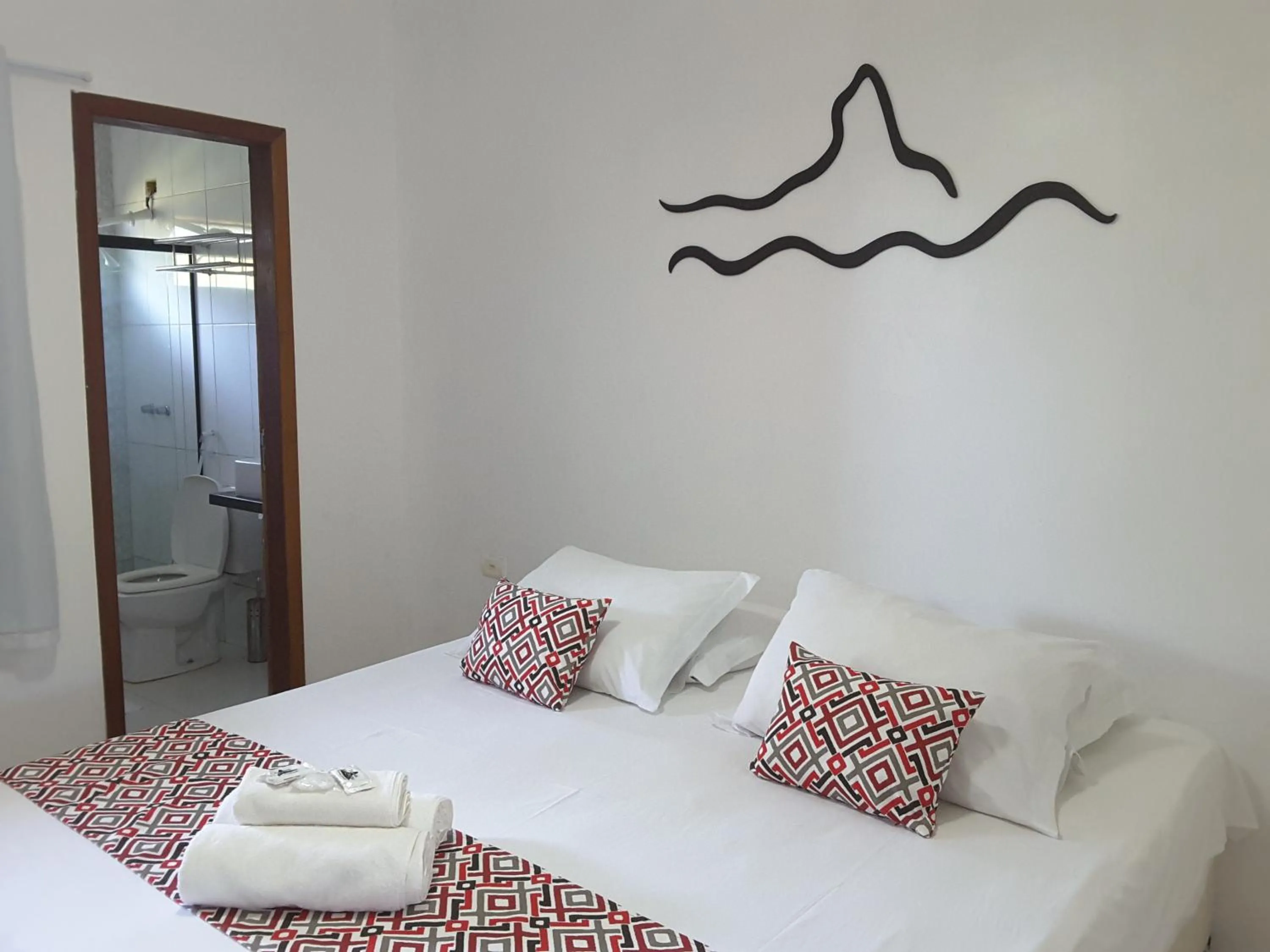 Bed in Pousada Morro do Pico