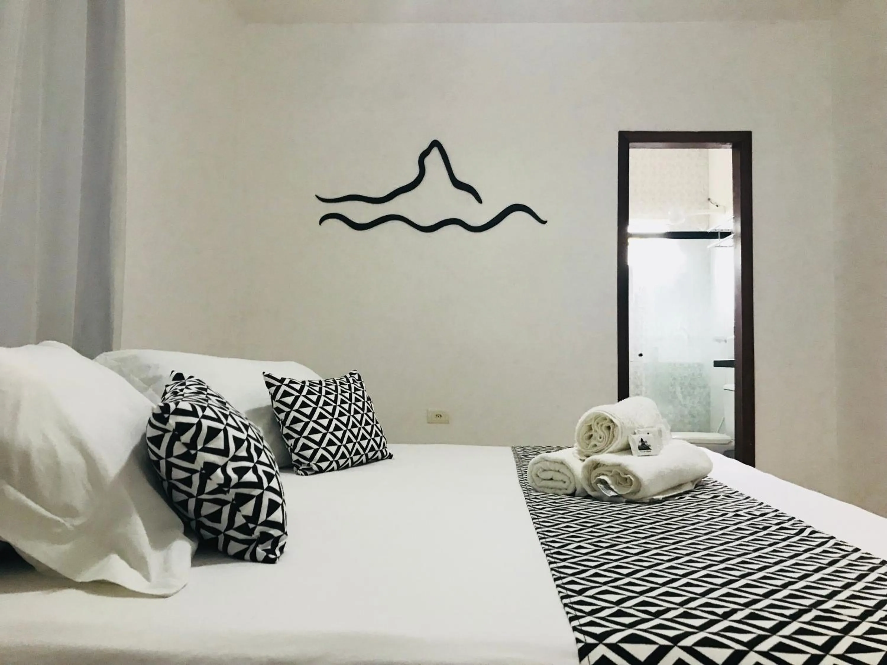 Bed in Pousada Morro do Pico