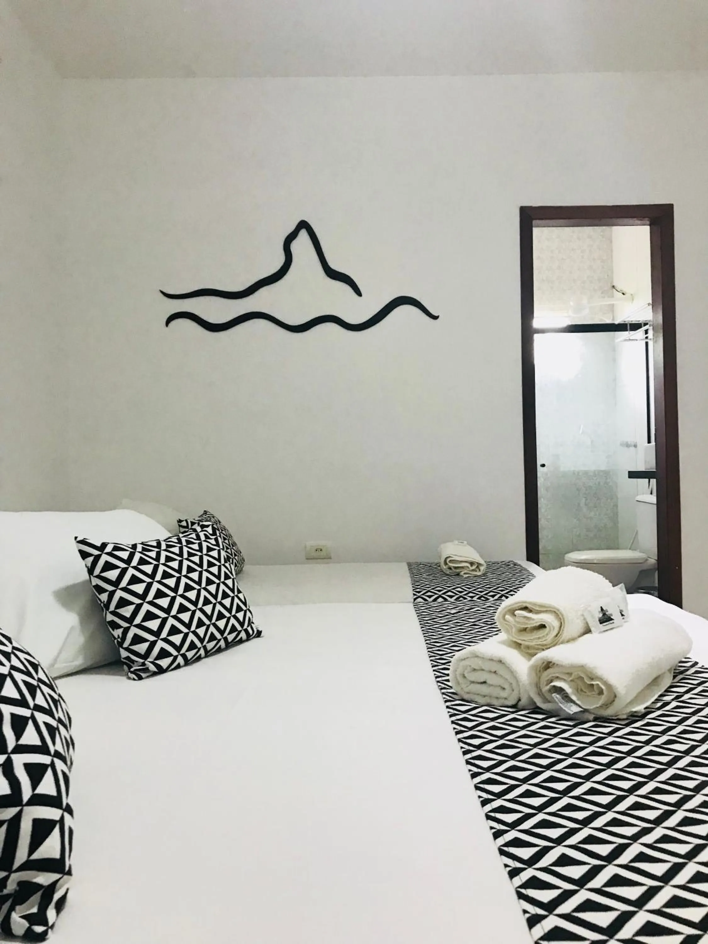 Bed in Pousada Morro do Pico
