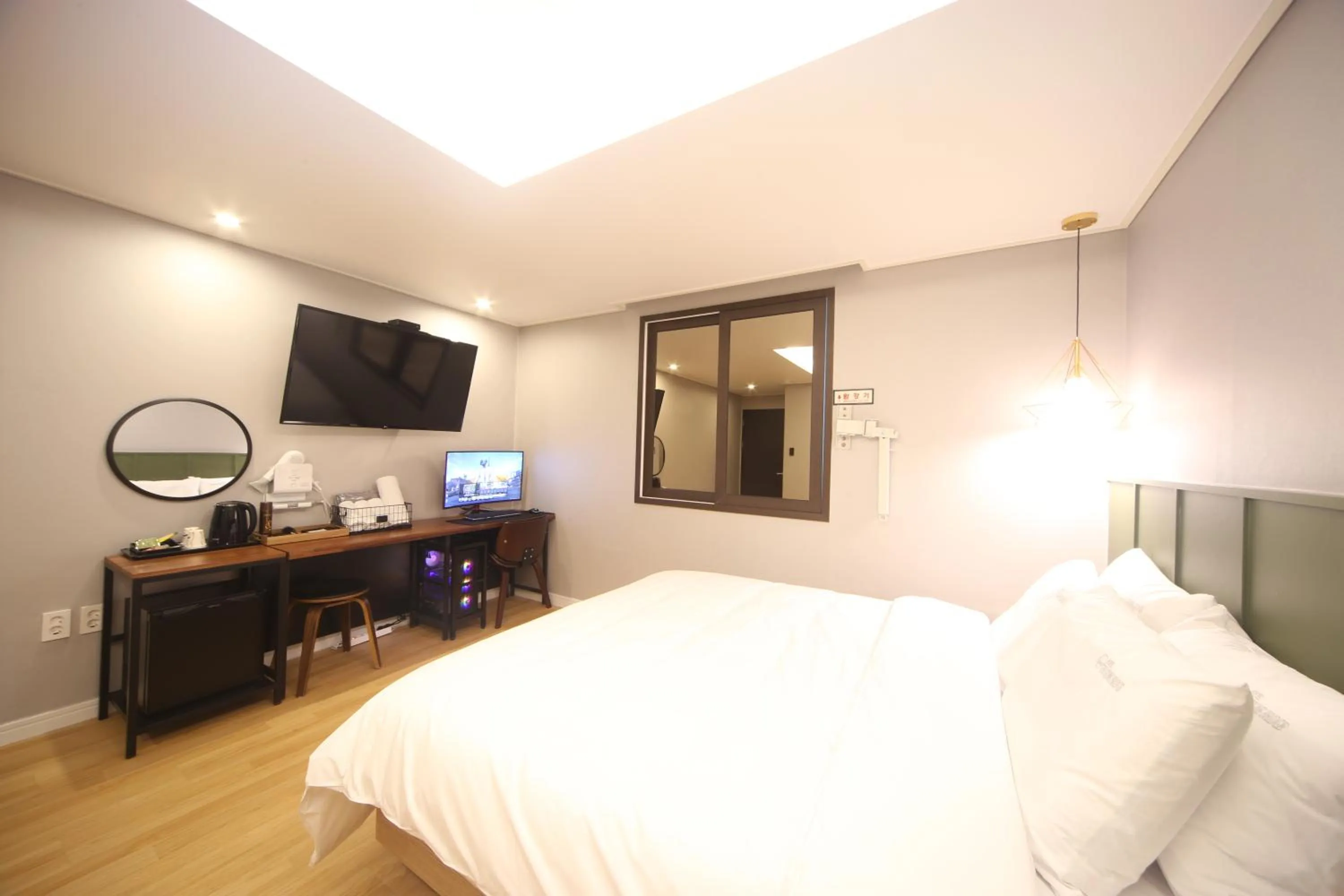 Bed in The Stone Bridge Hotel Sasang