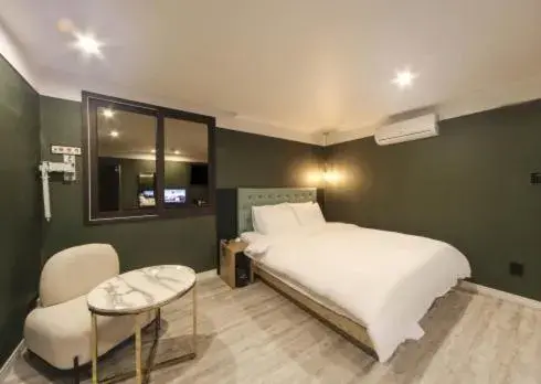 Bed in The Stone Bridge Hotel Sasang Bed in The Stone Bridge Hotel Sasang