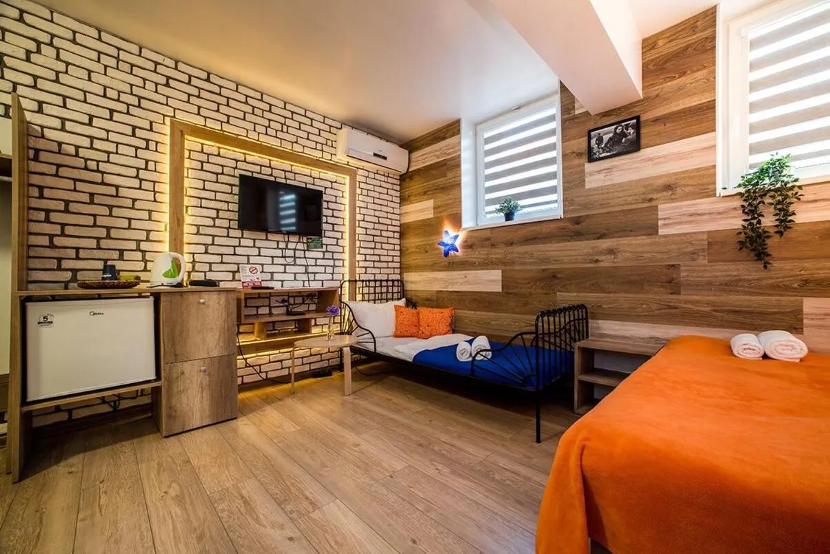 Bed in Fox Rooms Aparthotel