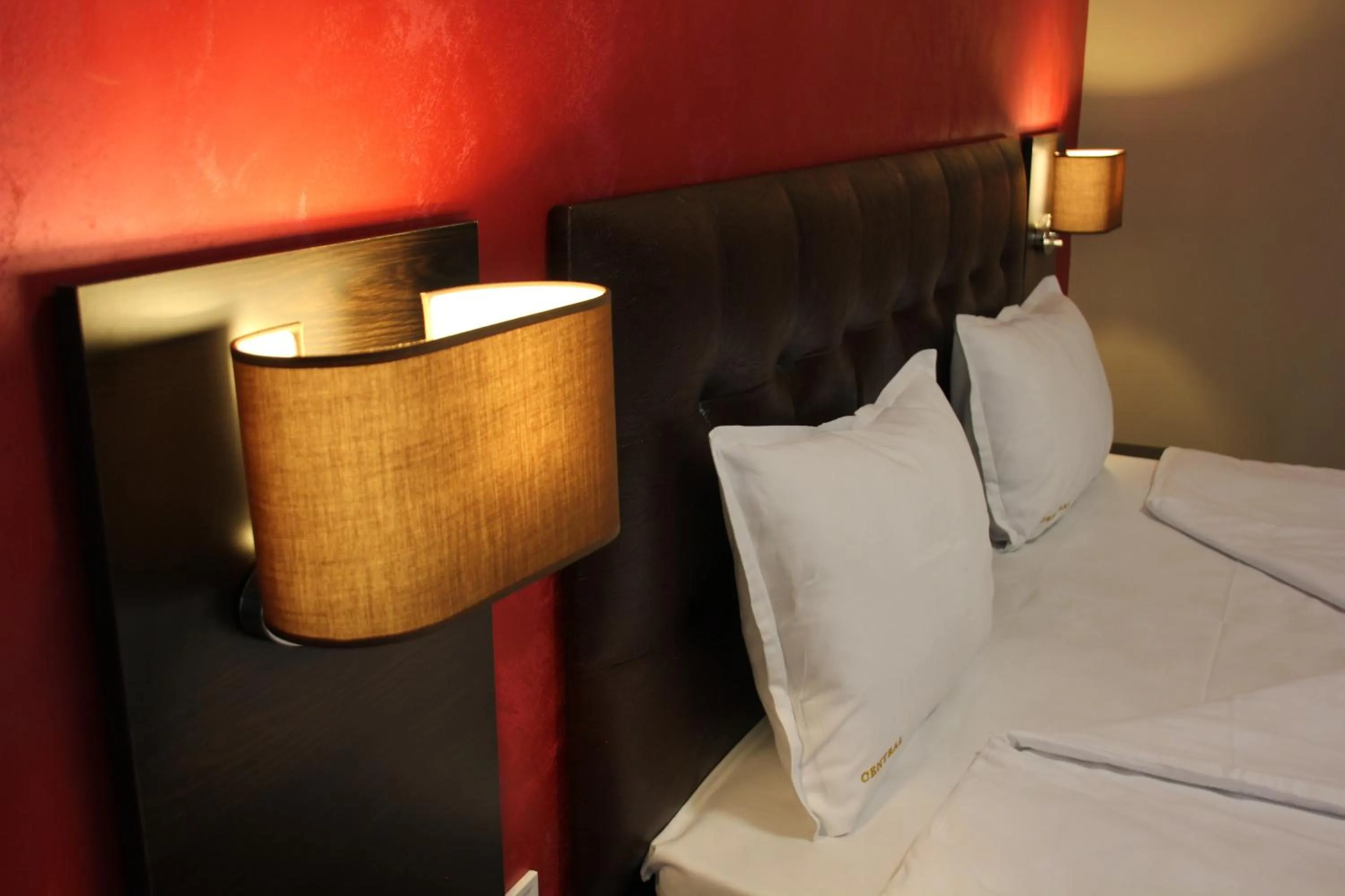 Bed in Central Guest Rooms